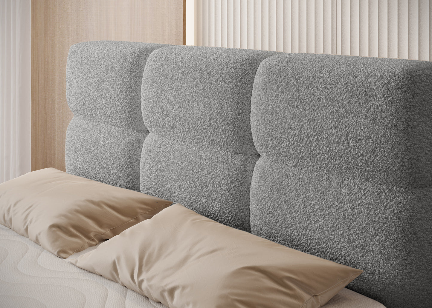 Zbliżenie na miękko tapicerowany zagłówek łóżka Royal 04 w szarej tkaninie – komfort i elegancja w sypialni.