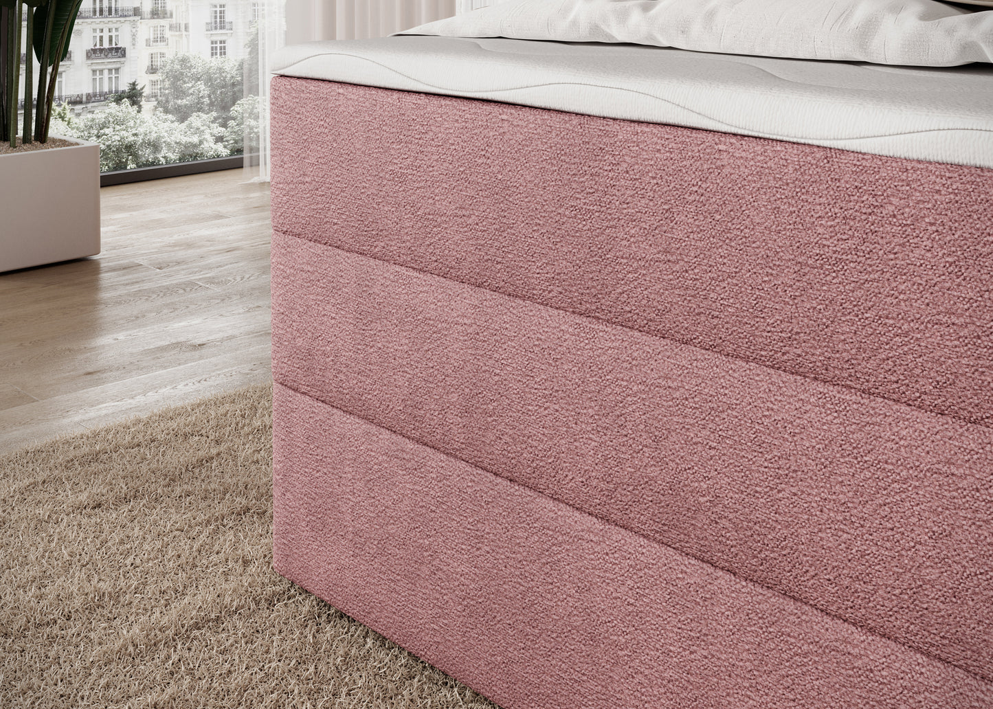 Korpus łóżka Kasped w różowej tkaninie Touch 24 – solidna tapicerowana bryła z elegancką strukturą materiału.