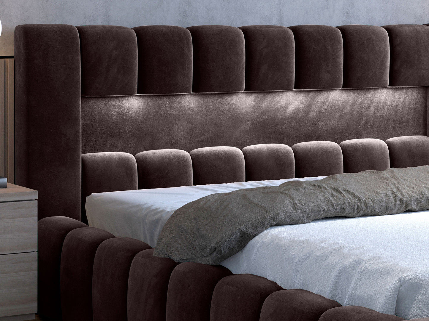 Zbliżenie wezgłowia łóżka Lamica 160x200 z podświetleniem LED; tapicerka Monolith 29 brązowy.