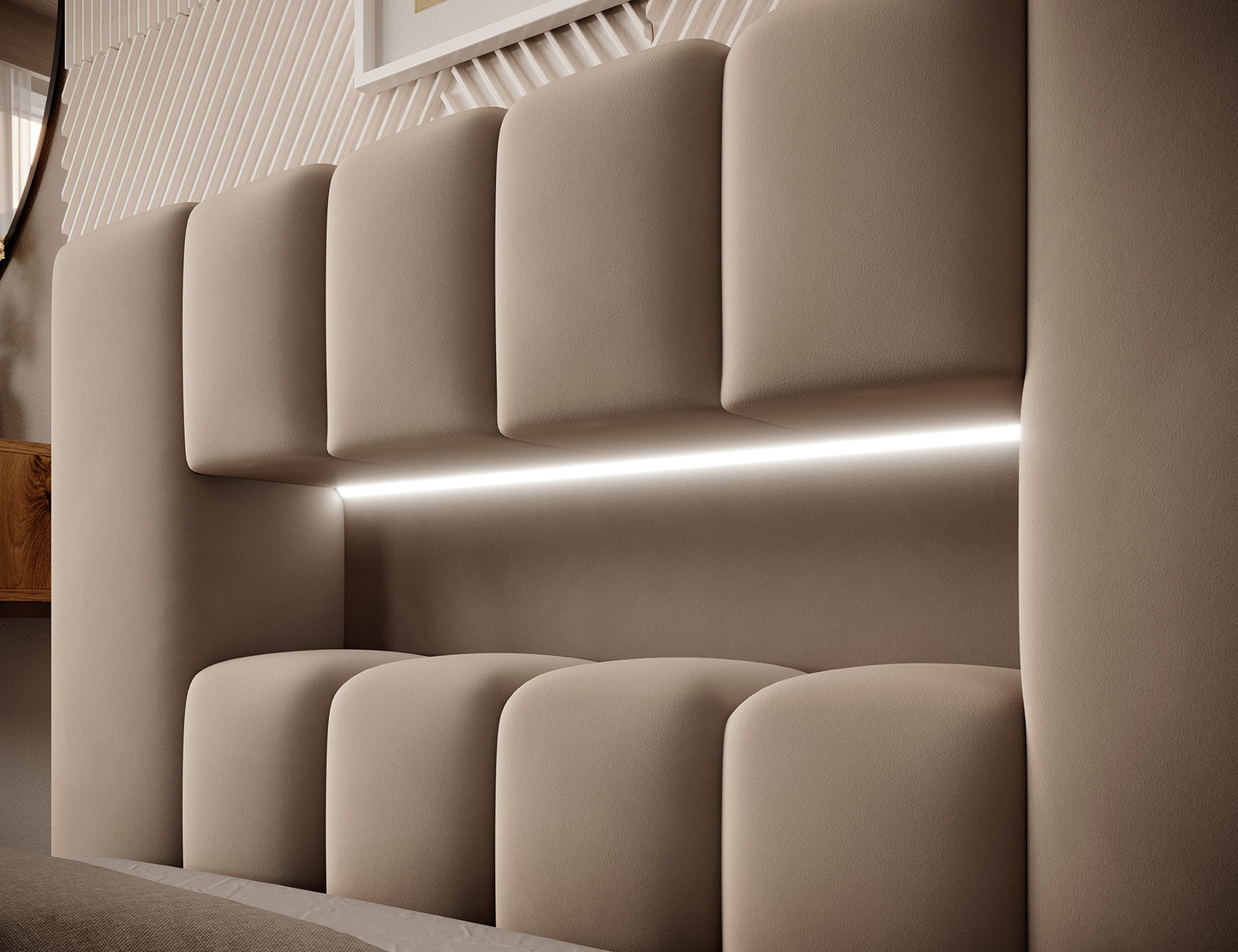 Zbliżenie na wezgłowie łóżka Lamica I Nube 20 z wbudowanym subtelnym podświetleniem LED i pikowanymi, zaokrąglonymi panelami.