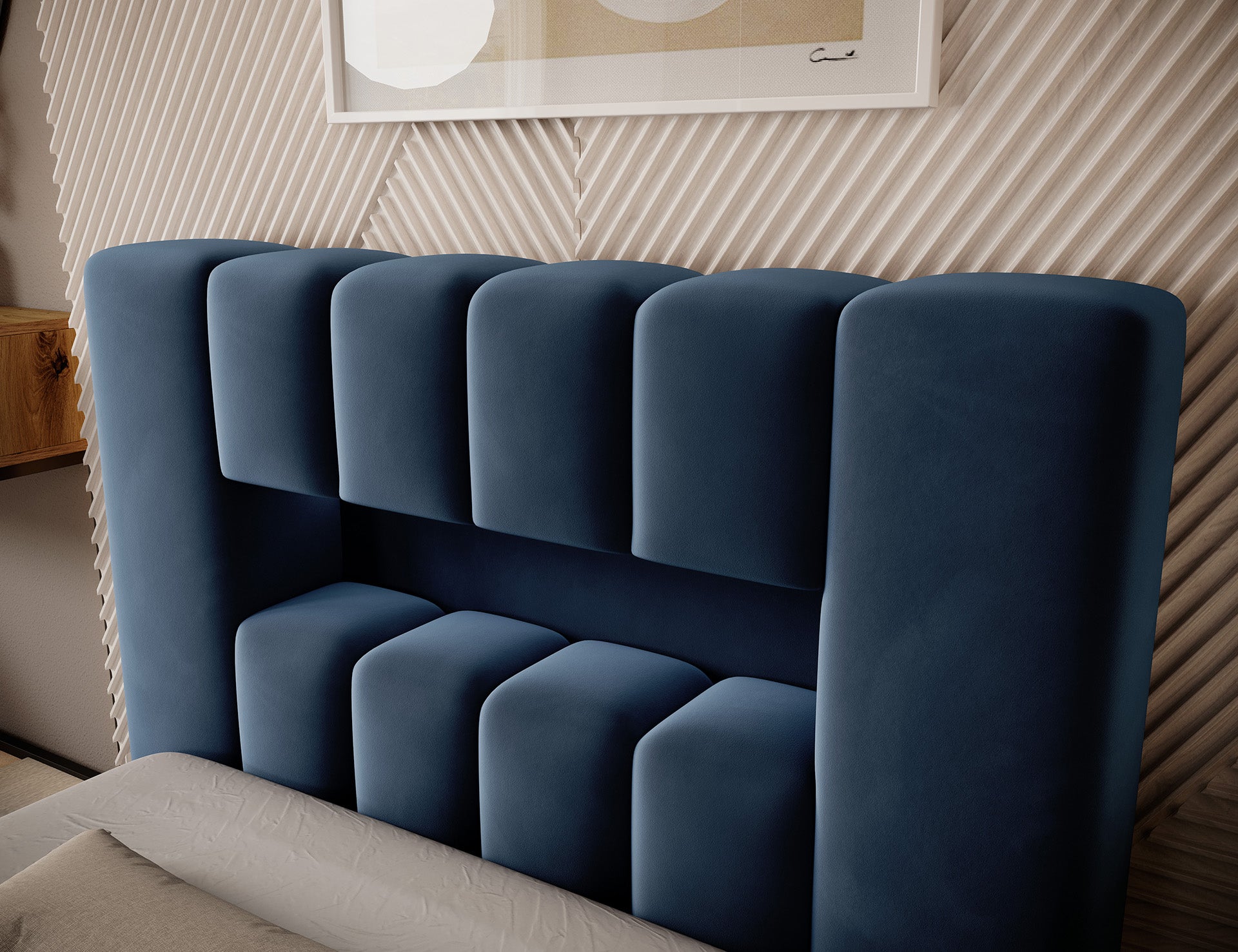 Detal bocznej części wezgłowia Lamica I Nube 40, ukazujący miękkie, granatowe, zaokrąglone moduły tapicerki.