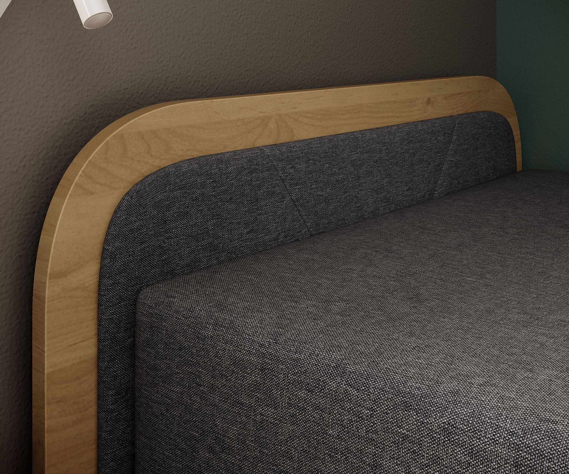 Zbliżenie na tapicerowany zagłówek łóżka Parys w tkaninie Sawana 05 ciemnoszary (układ lewy) z obramowaniem z jasnego drewna.