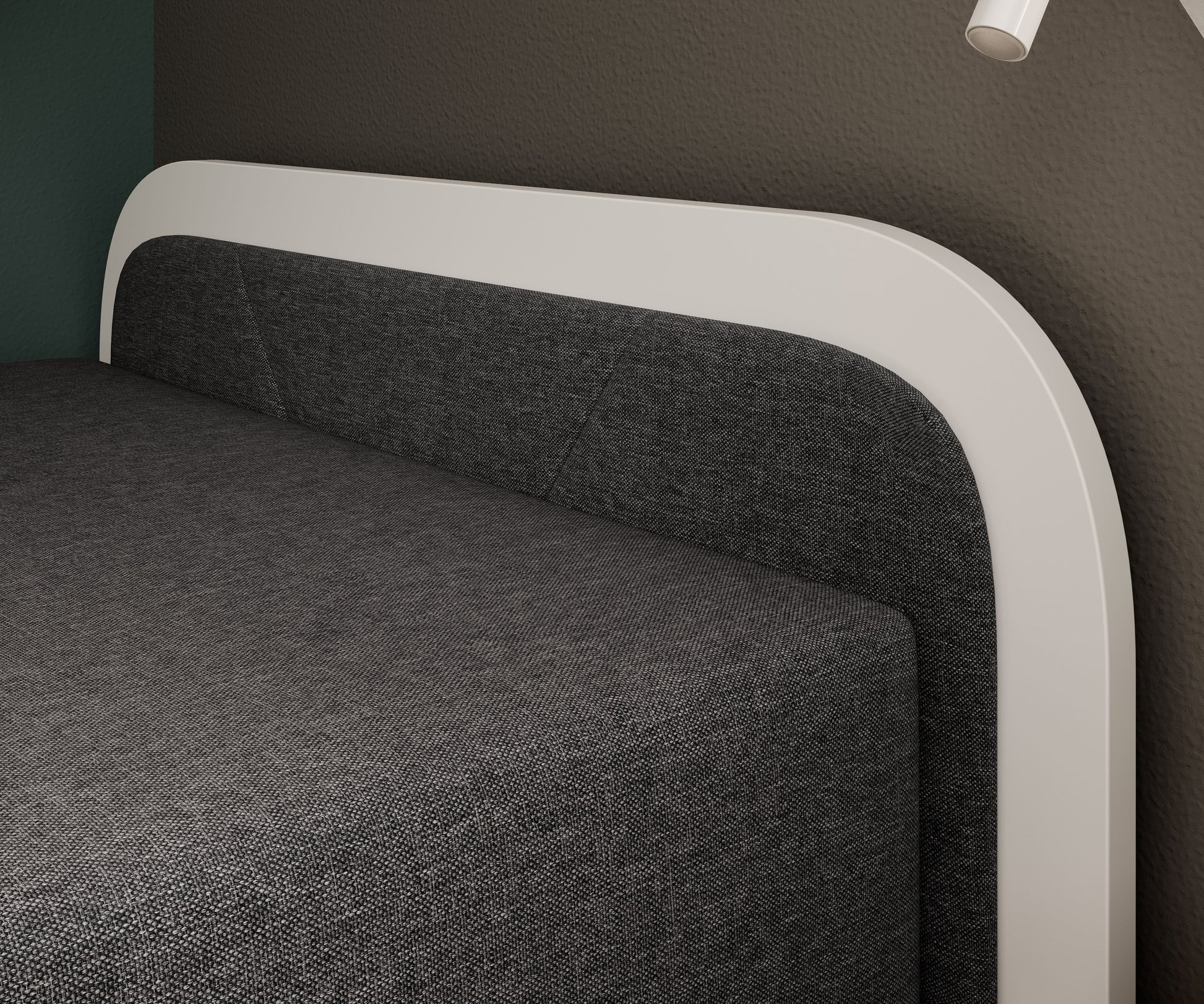 Zbliżenie na zagłówek łóżka Parys I w tkaninie Sawana 05 ciemnoszary, prawostronna biała rama z zaokrąglonym wykończeniem.