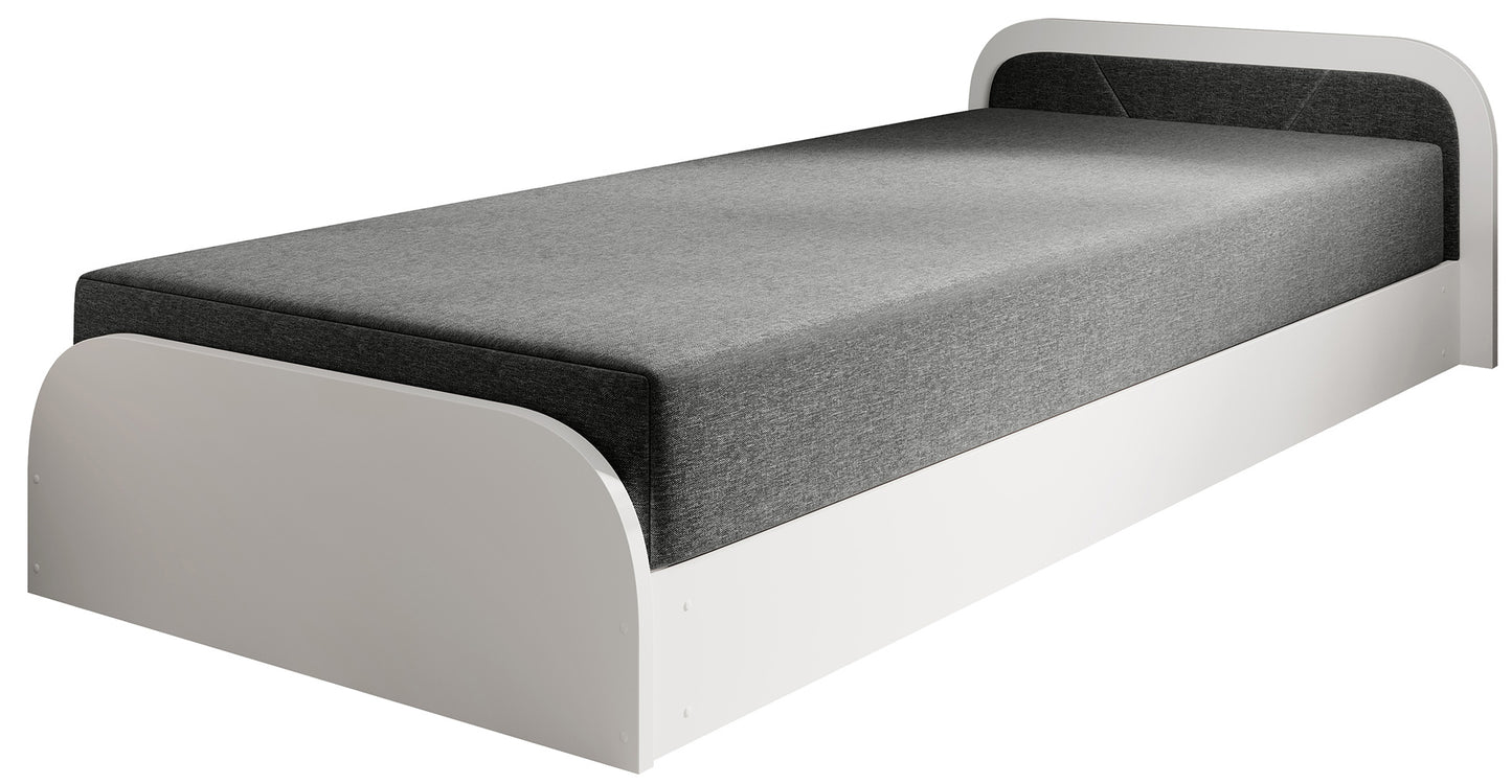 Perspektywa pokoju z łóżkiem Parys I w tapicerce Sawana 21 szary, prawostronnie ustawionym zagłówkiem, obok biurka z metalowym krzesłem i pufy na jasnej podłodze.