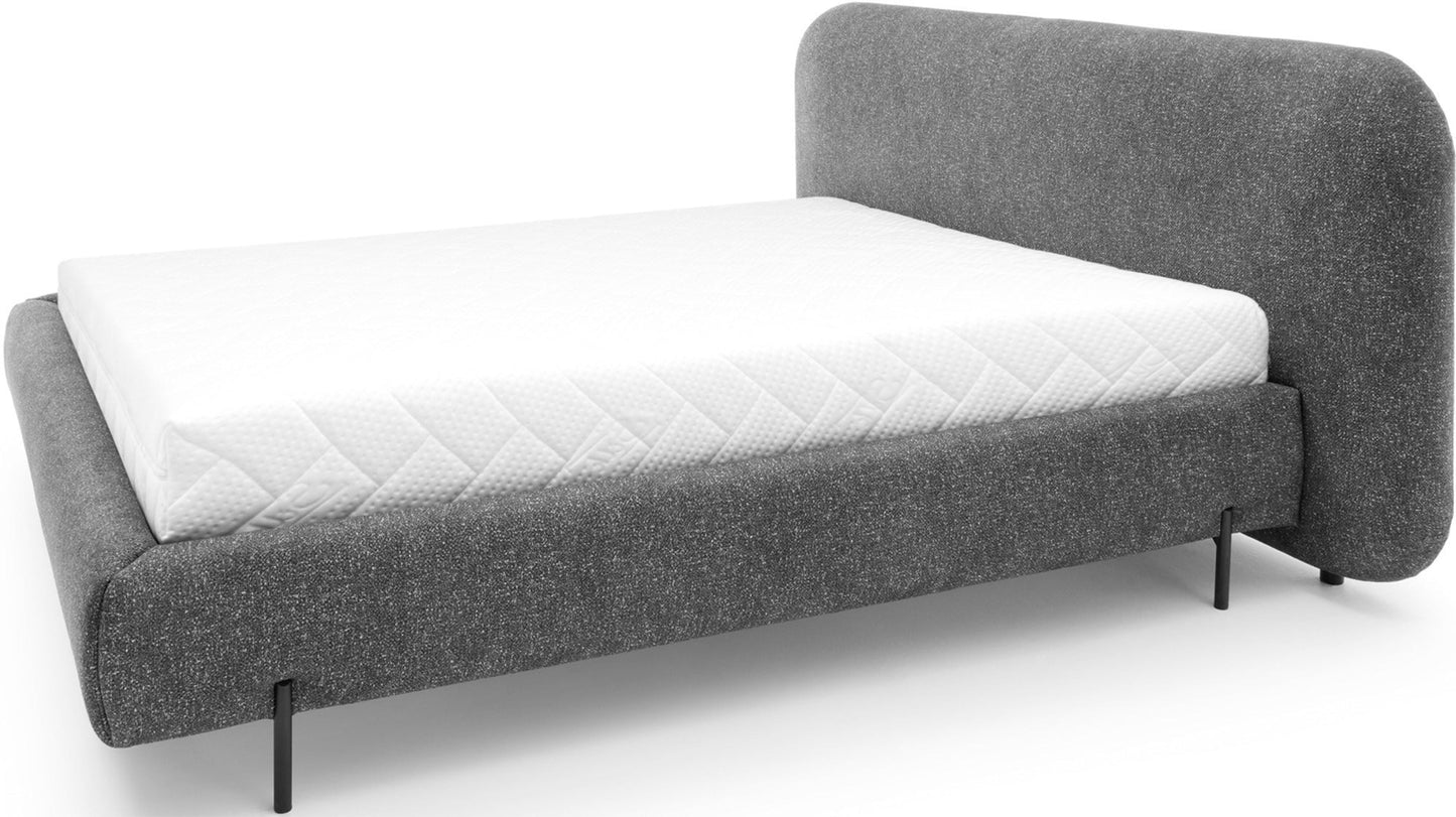 Zdjęcie prezentuje nowoczesne łóżko Pointt z tapicerowanym zagłówkiem w tkaninie Breona 04 – prostota w eleganckim wydaniu.