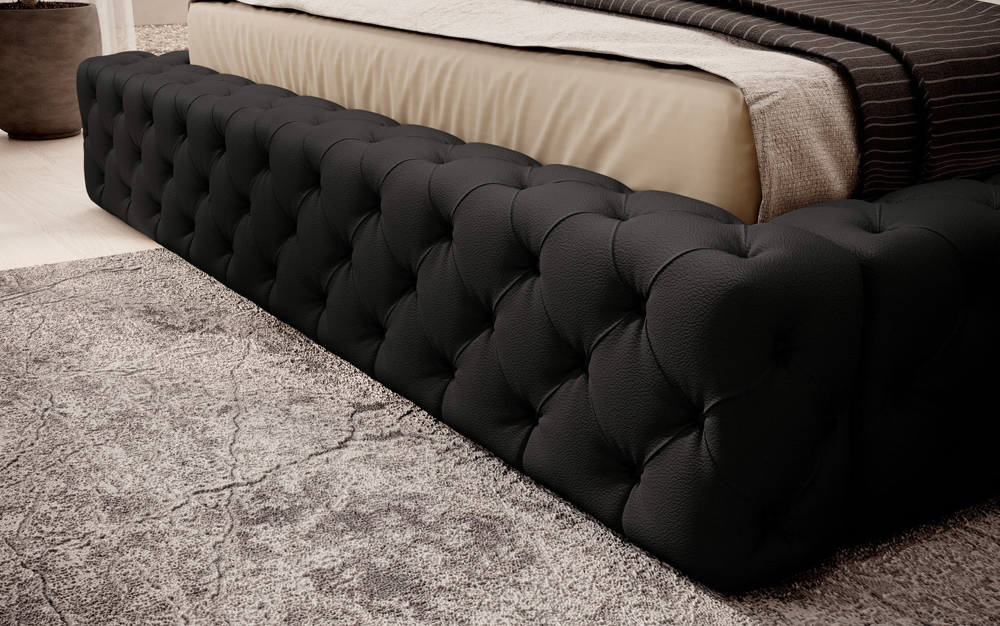 Detal narożnika łóżka Princce 160x200 Softis 11 czarny – miękkie tapicerowane wykończenie o welurowej strukturze.