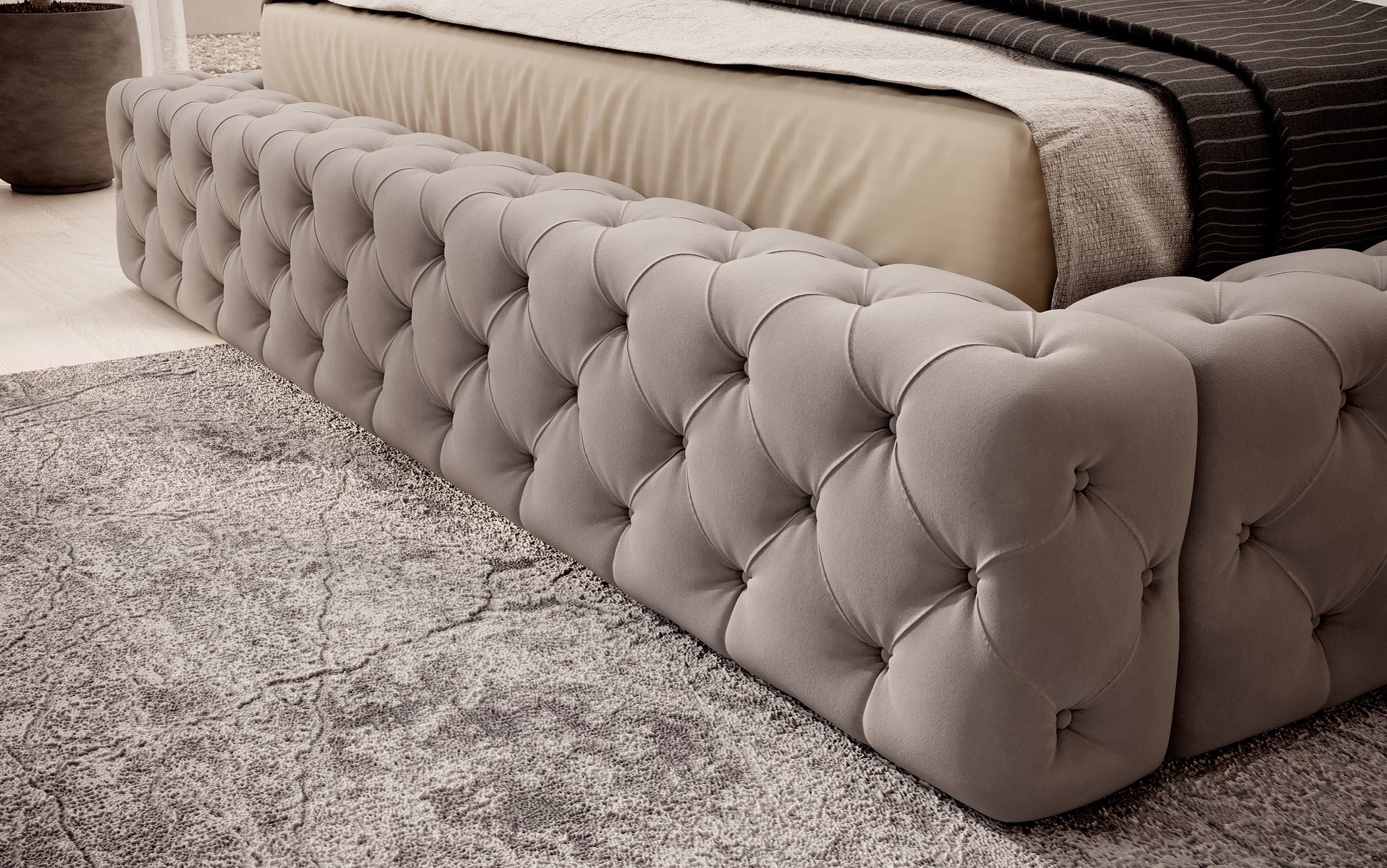 Detal narożnika łóżka Princce 140x200 Sola 18 beżowy – miękkie tapicerowane wykończenie o tkaninowej strukturze.