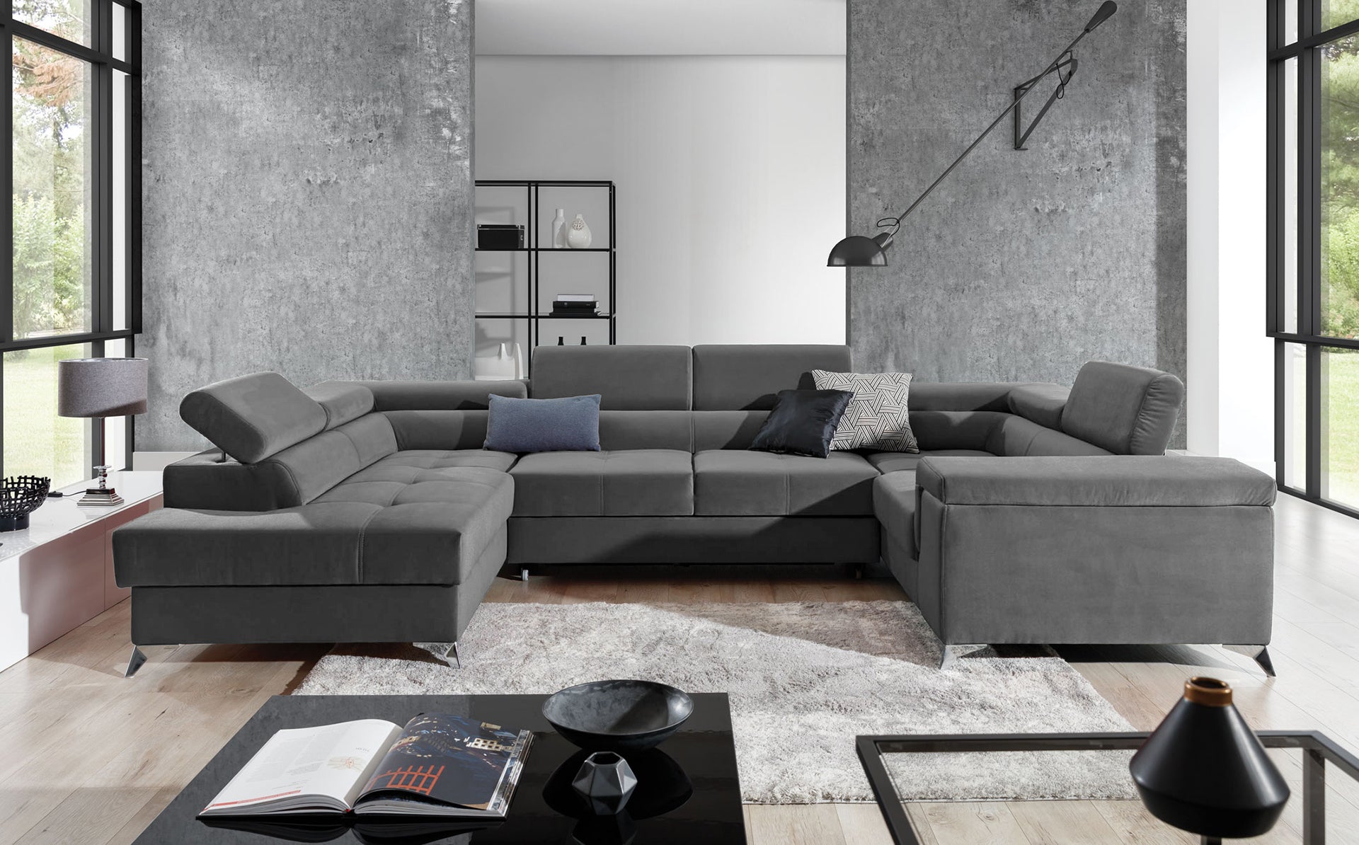 Nowoczesny narożnik Thiago w kolorze ciemnoszarym z szerokimi siedziskami i eleganckimi metalowymi nóżkami doskonale sprawdzi się w salonie urządzonym w stylu loftowym lub minimalistycznym. Stylowy narożnik do nowoczesnych wnętrz łączy wygodę z funkcjonalnością.