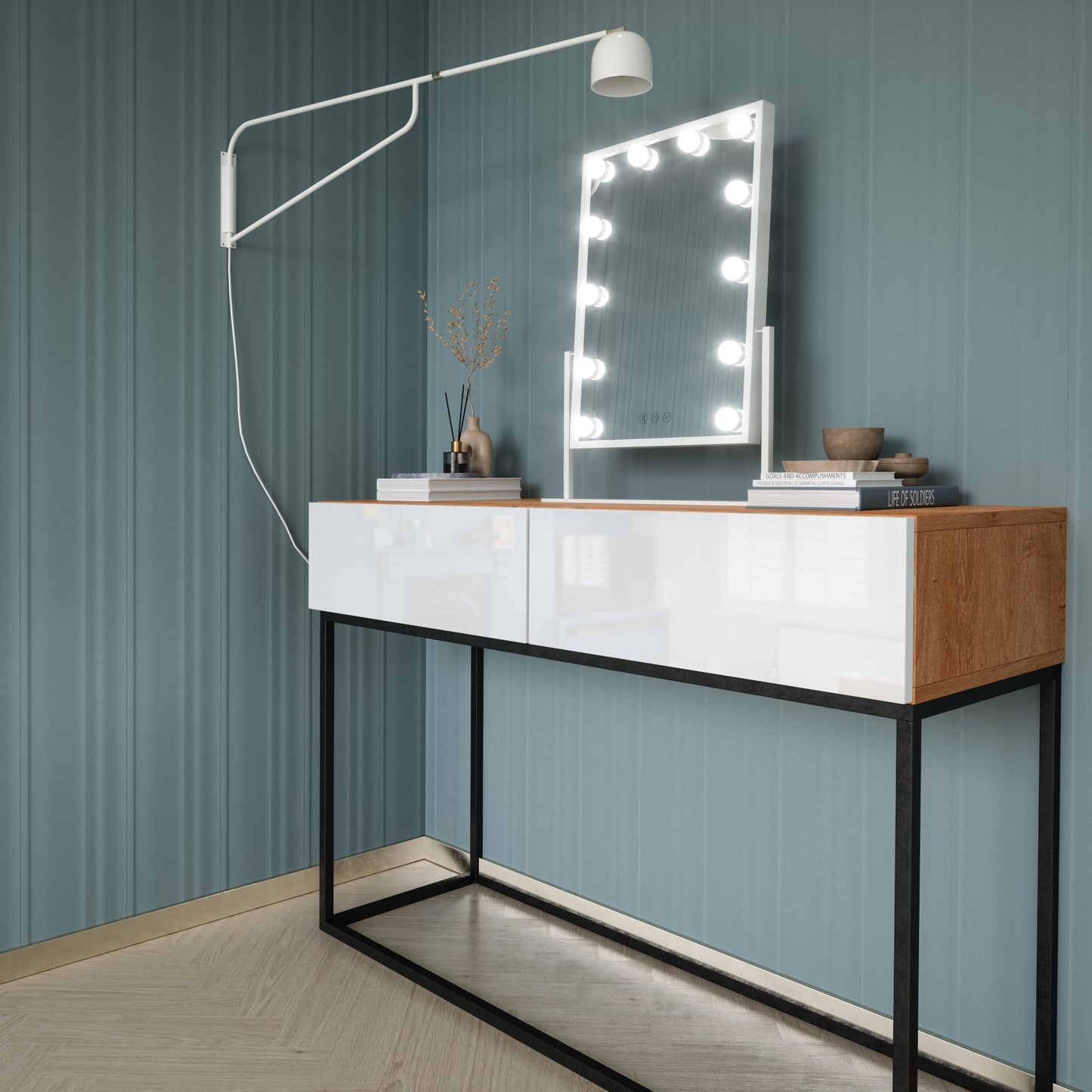 Prostokątne białe lustro Flamnate 30×47 cm postawione na stylowej konsoli z białymi frontami i czarną metalową podstawą na tle niebieskiej ściany.