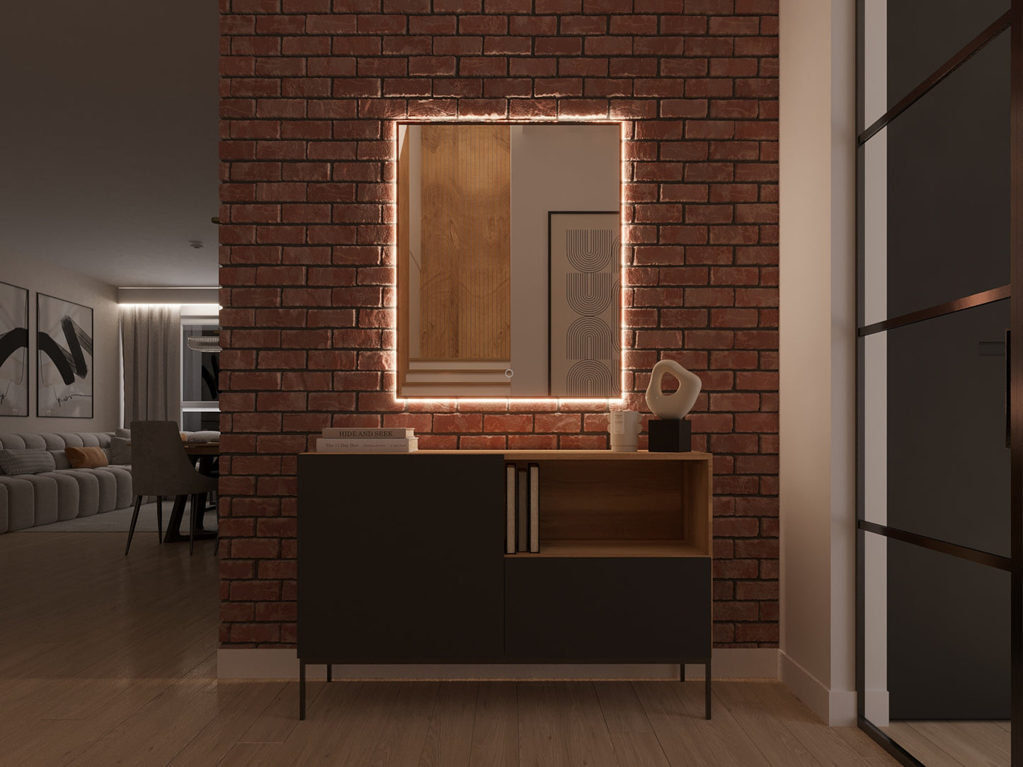 Czarne lustro Vixisse 66×81 cm z włączonym obwiedniowym oświetleniem LED, zamontowane nad stołem w nowoczesnym kąciku wypoczynkowym wieczorem.