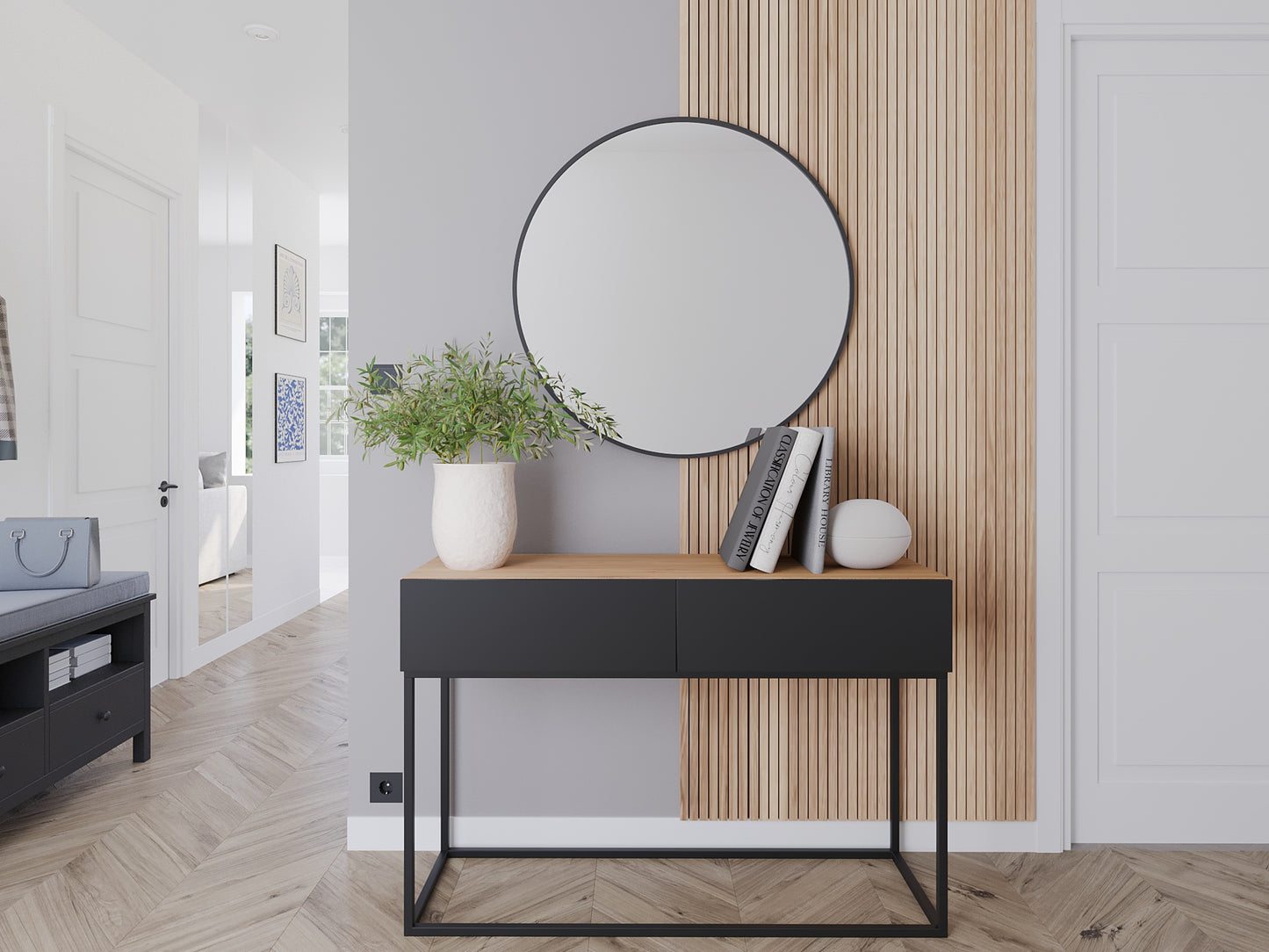 Okrągłe lustro Divissi 80 cm w aranżacji przedpokoju z konsolą w czarnym kolorze i drewnianym wykończeniem.