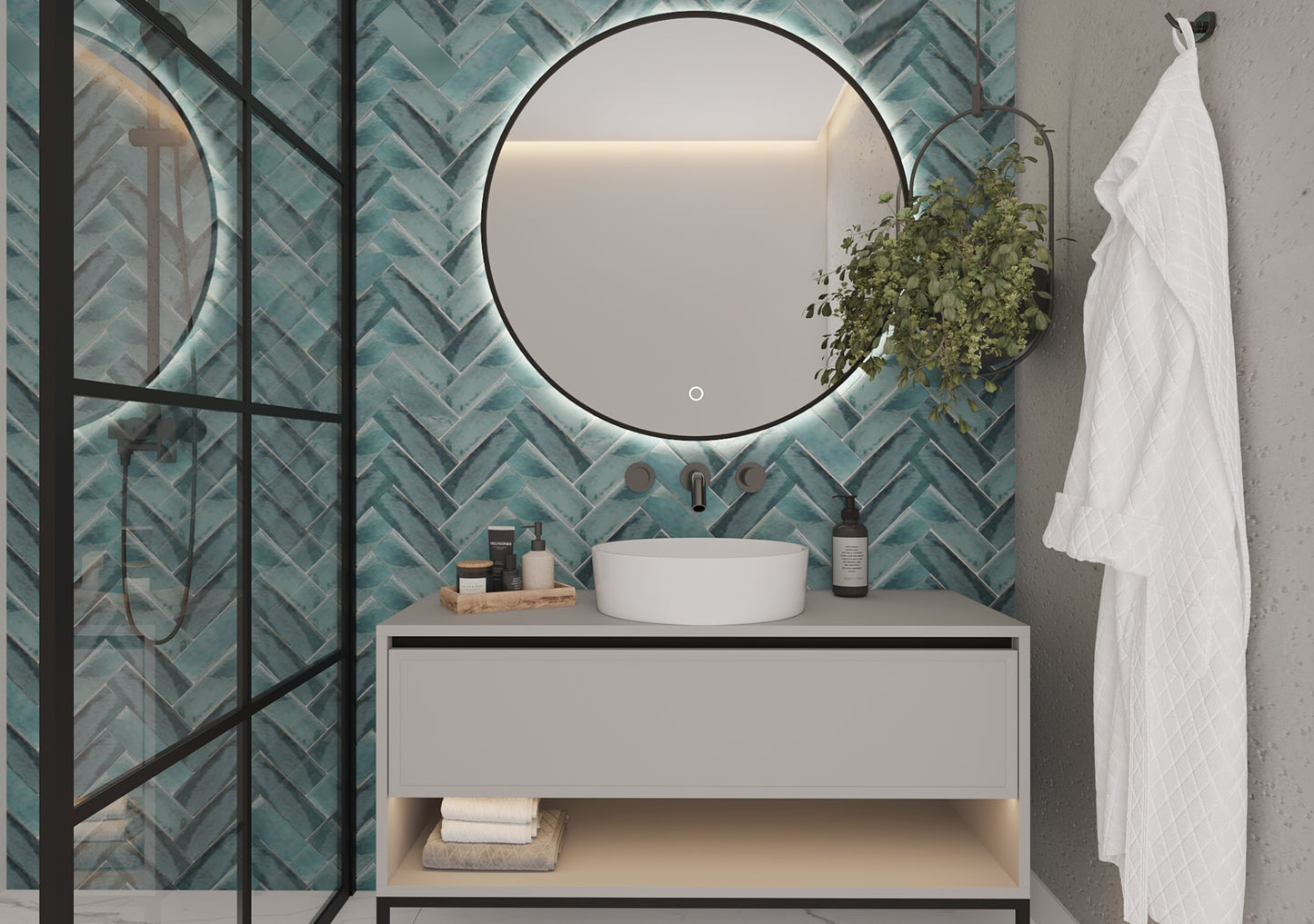 Lustro okrągłe Divissi A 80 cm LED zamontowane w łazience z turkusową ścianą w jodełkę i przeszkloną kabiną prysznicową.
