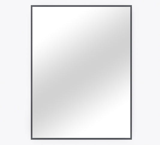 Prostokątne lustro Tressedi w cienkiej czarnej ramie o minimalistycznym designie. Nowoczesne lustro ścienne doskonale sprawdzi się w przedpokoju, sypialni, salonie lub łazience, optycznie powiększając wnętrze i dodając mu eleganckiego charakteru.