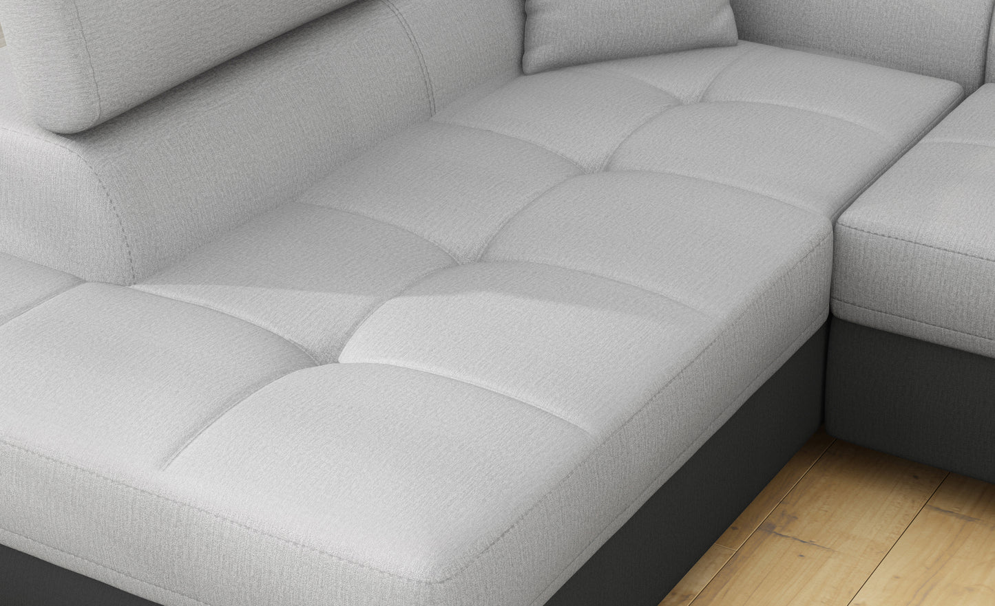 Zbliżenie na siedzisko narożnika Anton w kolorze Monolith 84 jasnoszary / Monolith 97 ciemnoszary.