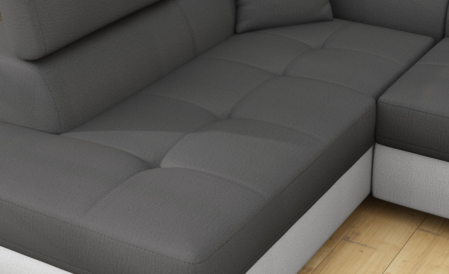 Zbliżenie na siedzisko narożnika Anton w kolorze Monolith 97 ciemnoszary / Monolith 84 jasnoszary.