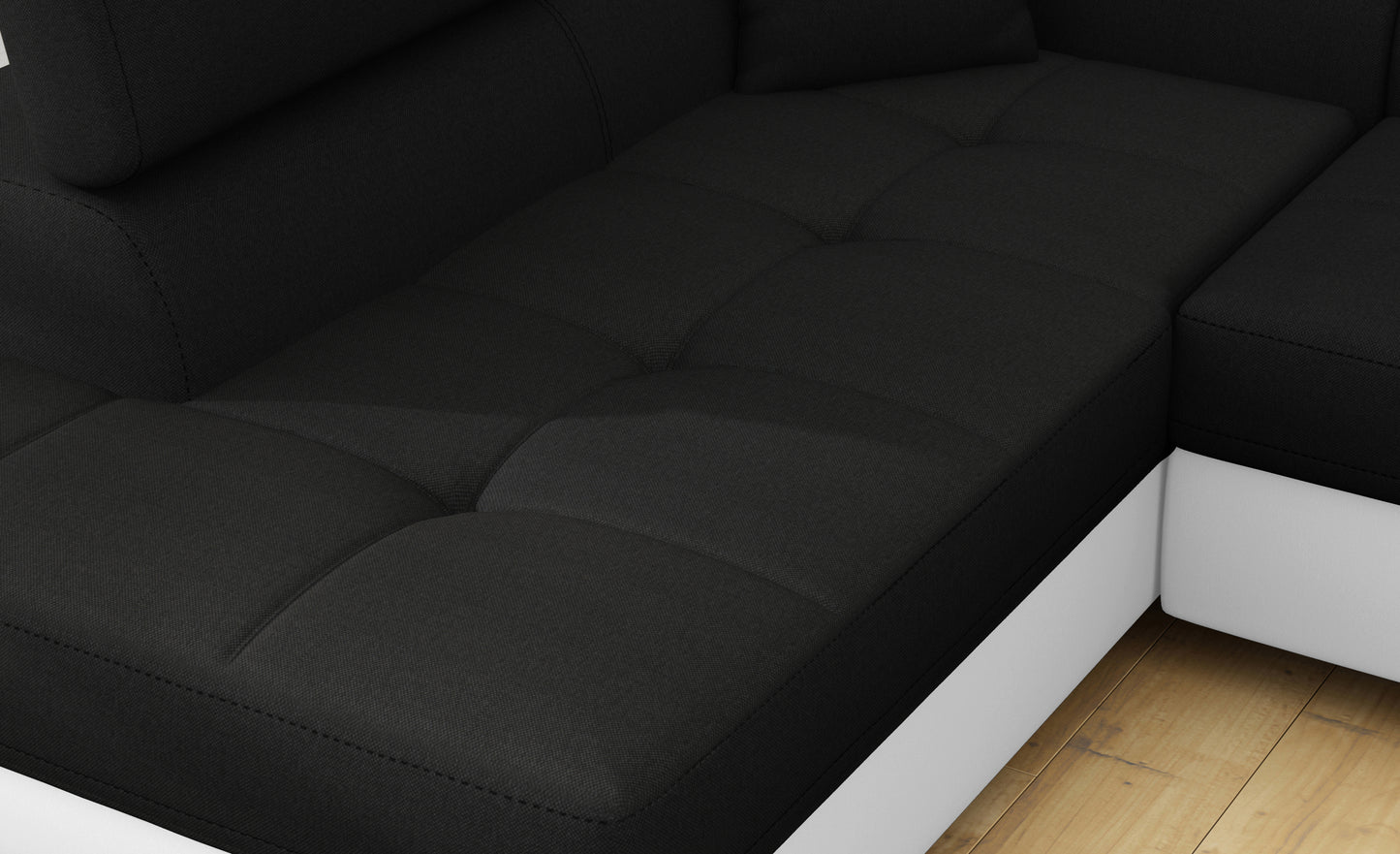 Zbliżenie na siedzisko narożnika Anton w kolorze Sawana 14 czarny / Soft 17 biały.