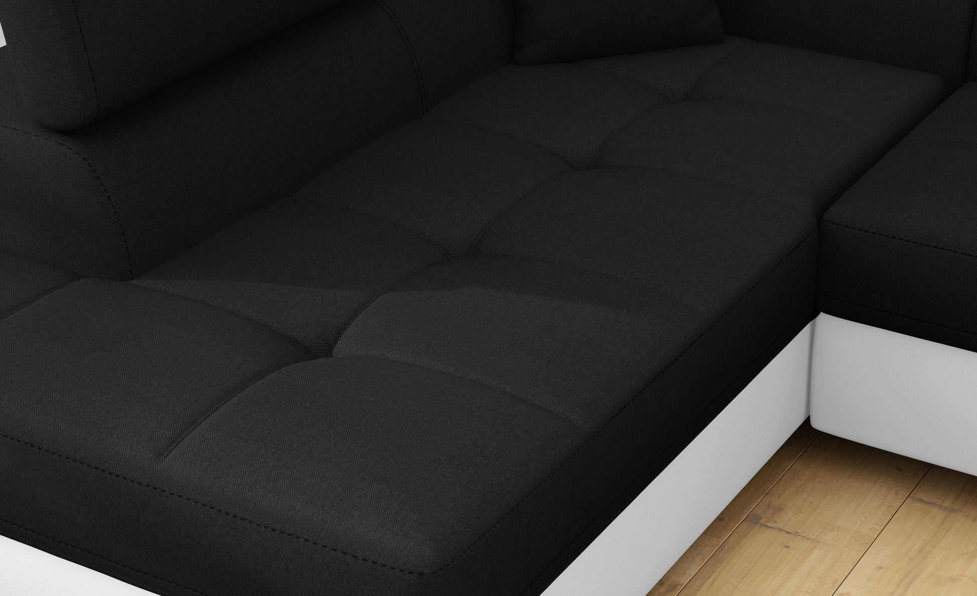 Zbliżenie na siedzisko narożnika Anton w kolorze Sawana 14 czarny / Soft 17 biały.