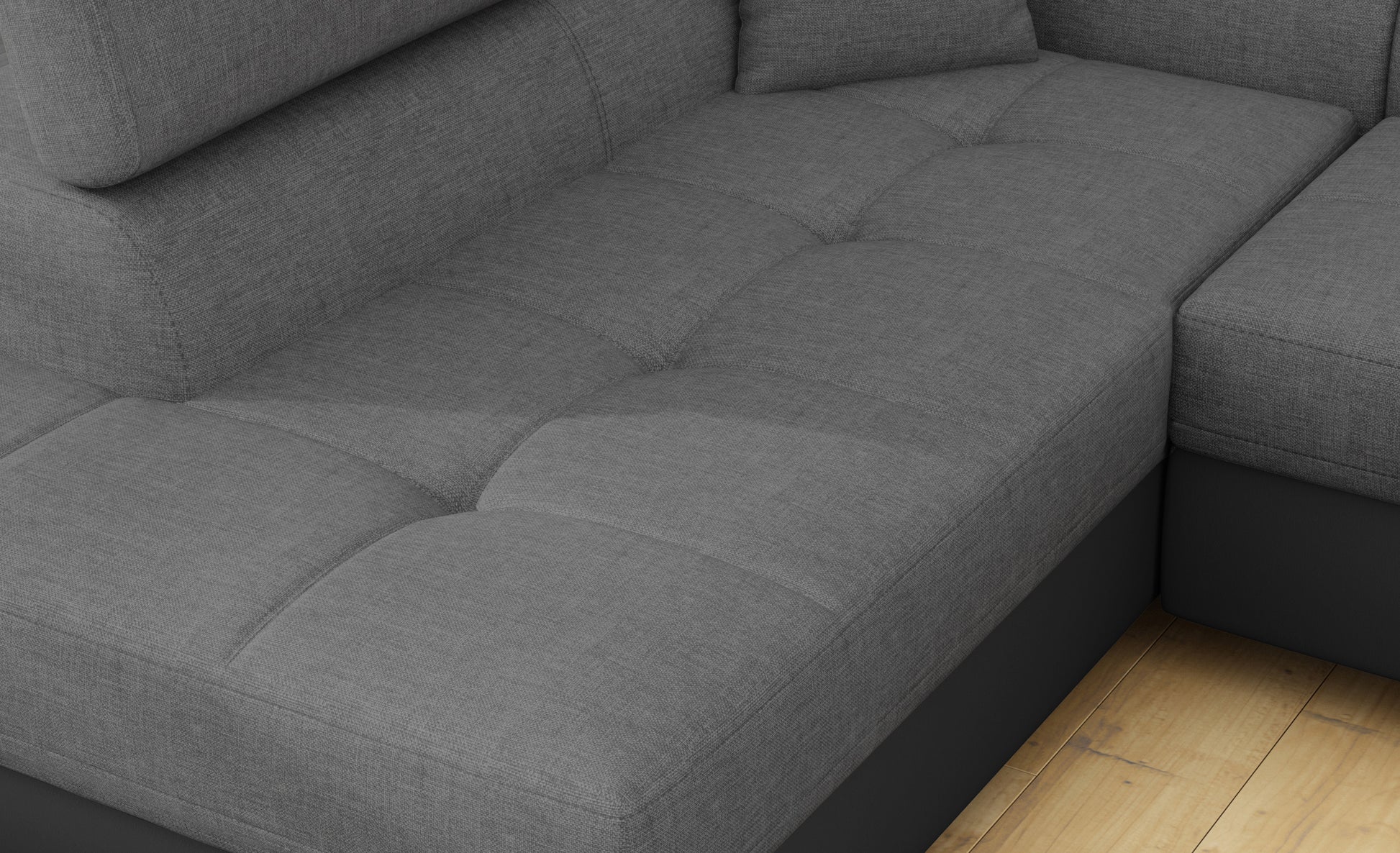 Zbliżenie na siedzisko narożnika Anton w kolorze Sawana 21 szary / Soft 11 czarny.