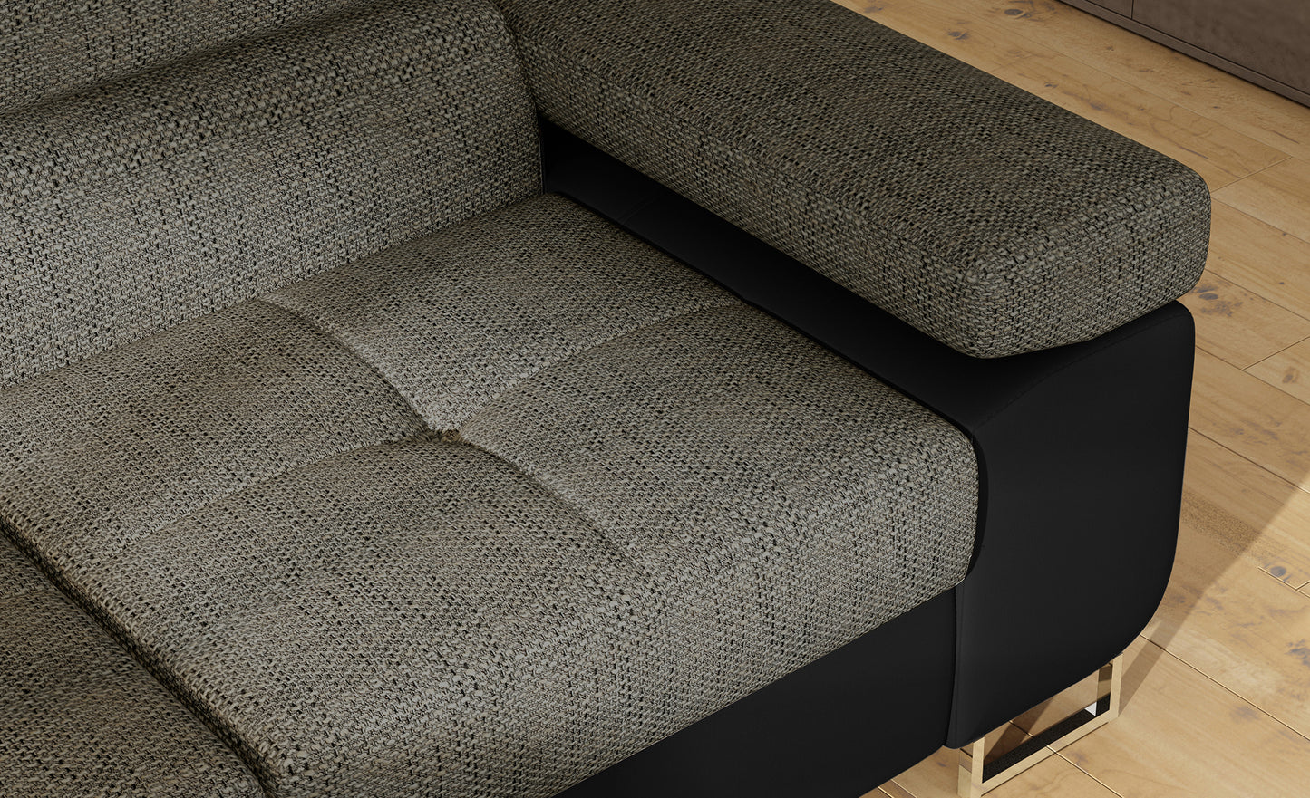 Zbliżenie na podłokietnik narożnika Anton w kolorze Berlin 01 czarny / Soft 11 czarny.