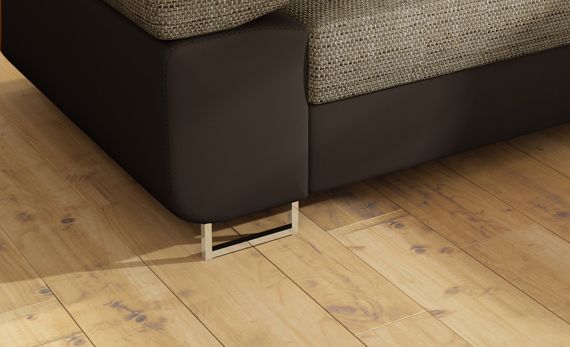 Detal metalowej nóżki narożnika Anton Berlin 03 ciemnobeżowy / Soft 66 brązowy.