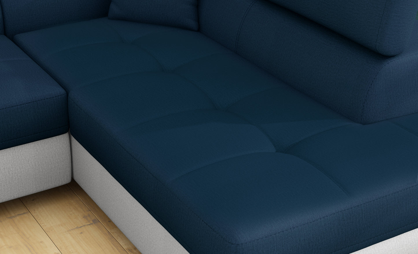 Zbliżenie na siedzisko narożnika Anton w kolorze Monolith 77 niebieski / Monolith 84 jasnoszary.