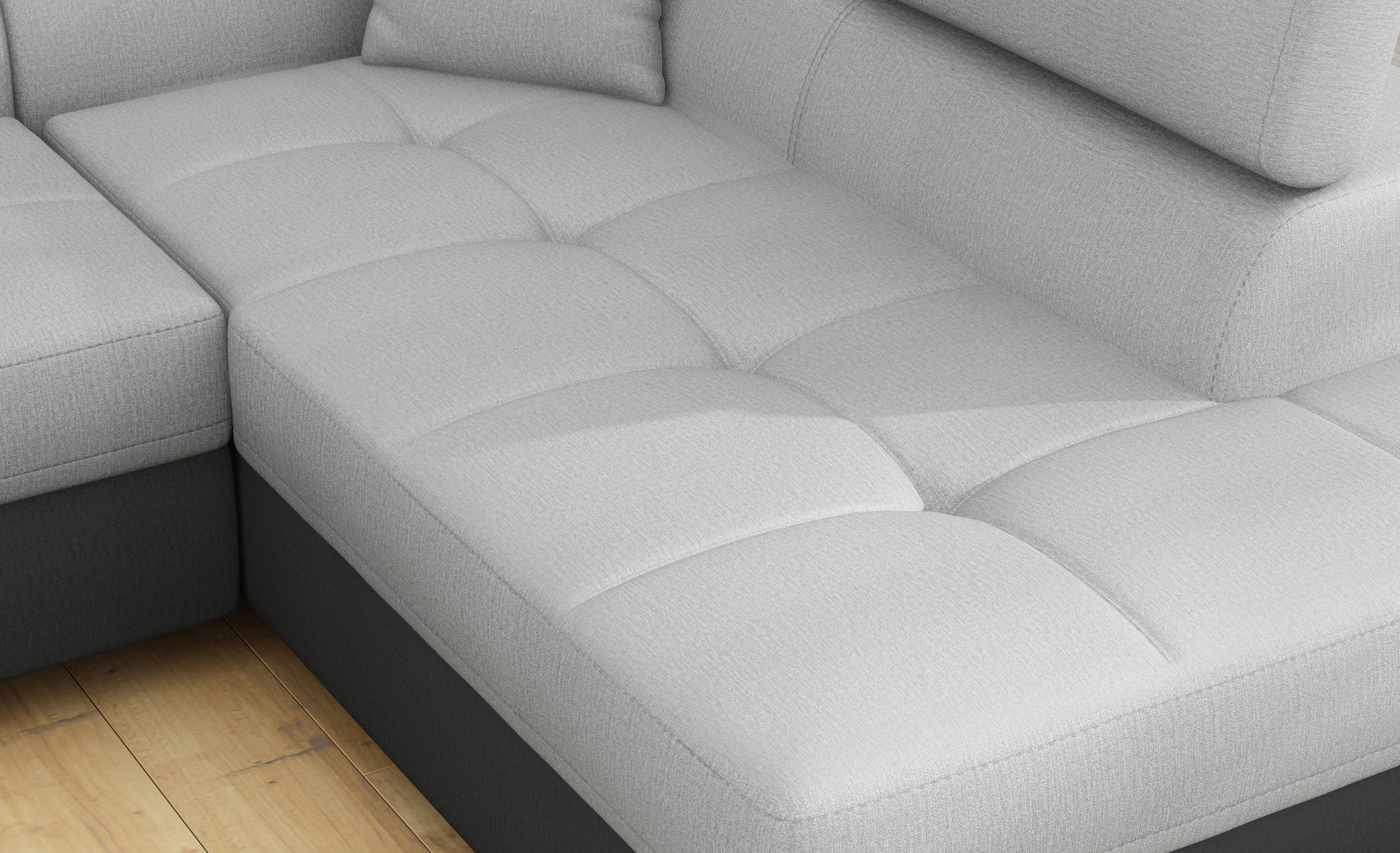 Zbliżenie na siedzisko narożnika Anton w kolorze Monolith 84 jasnoszary / Monolith 97 ciemnoszary.