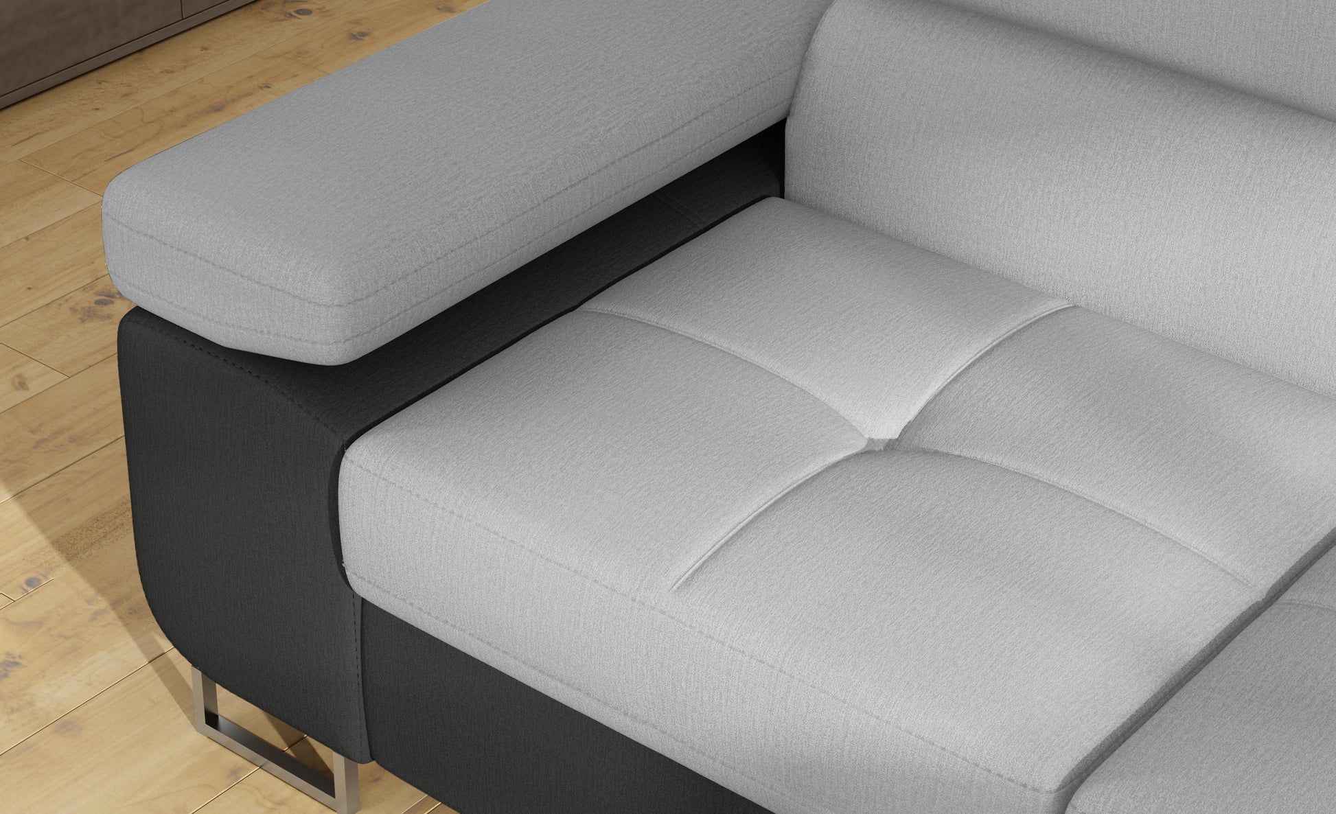 Zbliżenie na siedzisko narożnika Anton w kolorze Monolith 84 jasnoszary / Monolith 97 ciemnoszary.