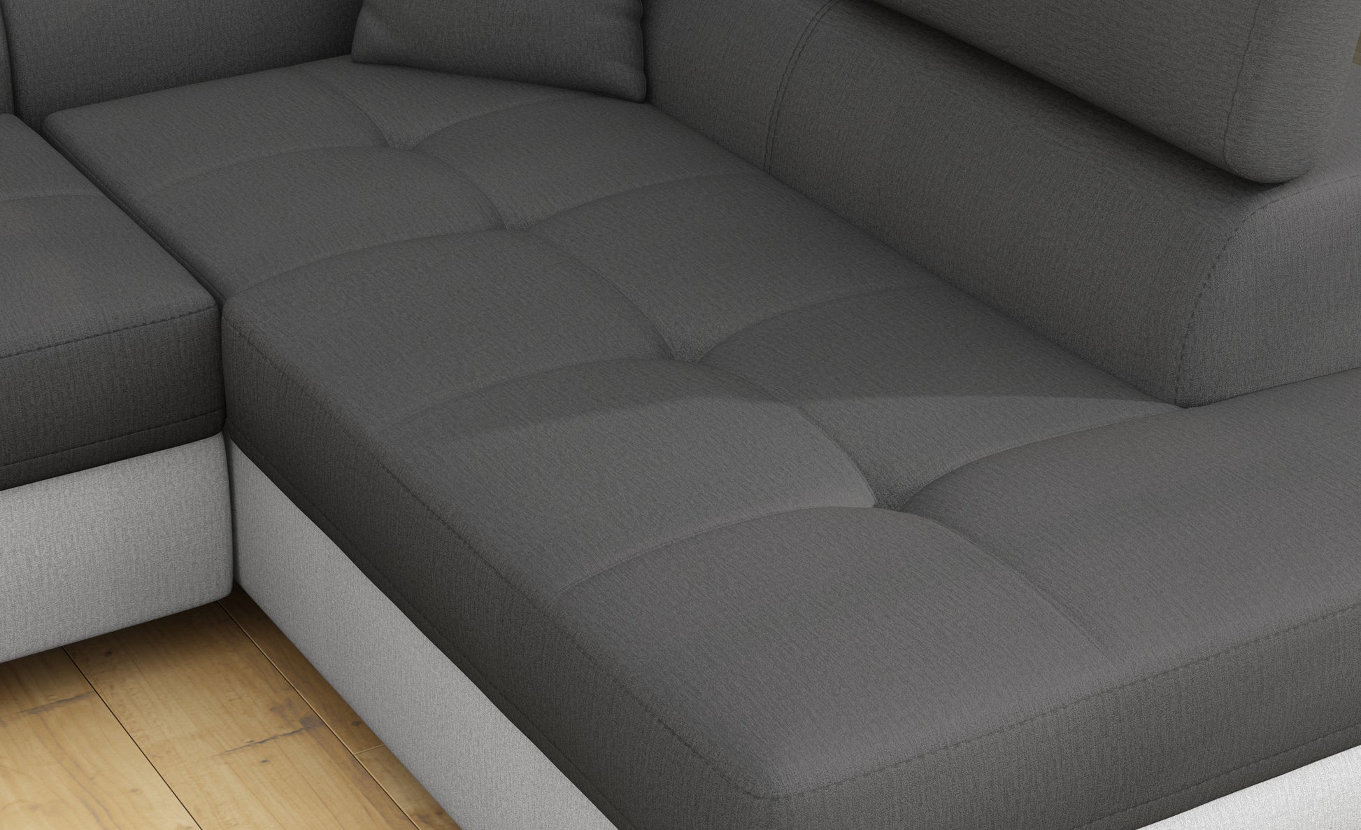 Zbliżenie na siedzisko narożnika Anton w kolorze Monolith 97 ciemnoszary / Monolith 84 jasnoszary.