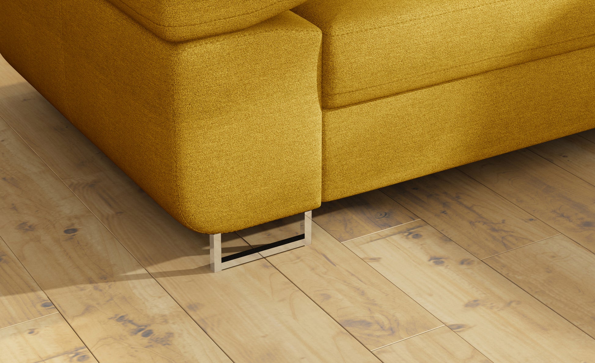 Detal metalowej nóżki narożnika Anton Omega 68 żółty.