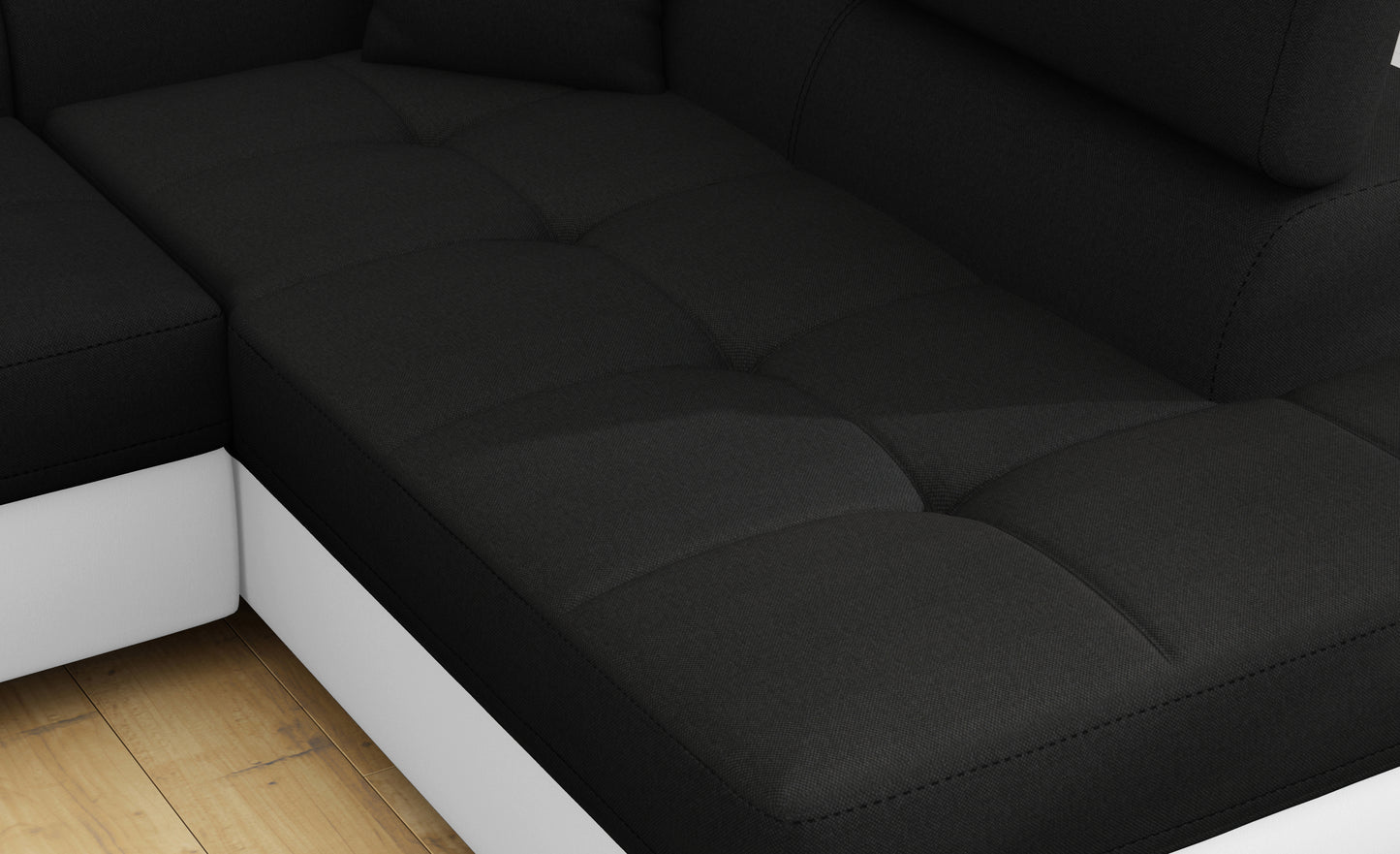 Zbliżenie na siedzisko narożnika Anton w kolorze Sawana 14 czarny / Soft 17 biały.