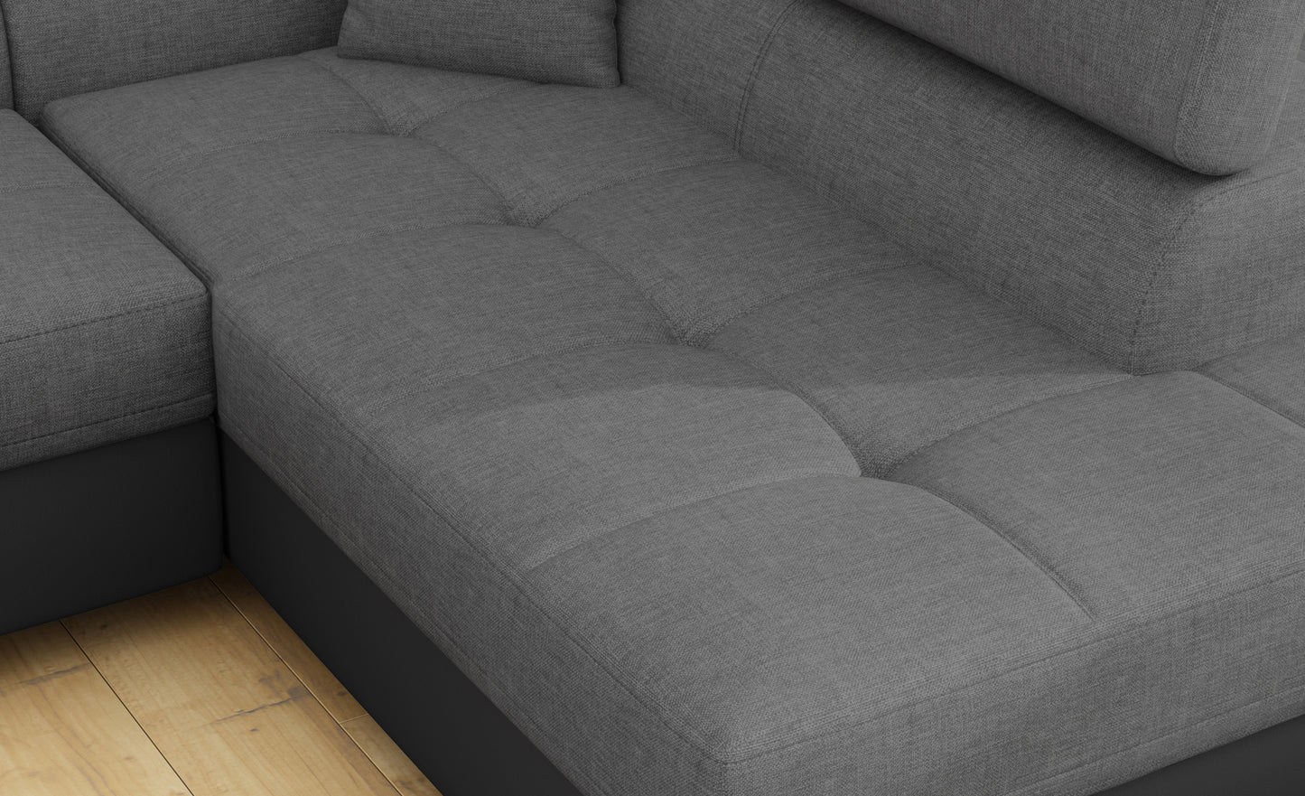 Zbliżenie na siedzisko narożnika Anton w kolorze Sawana 21 szary / Soft 11 czarny.