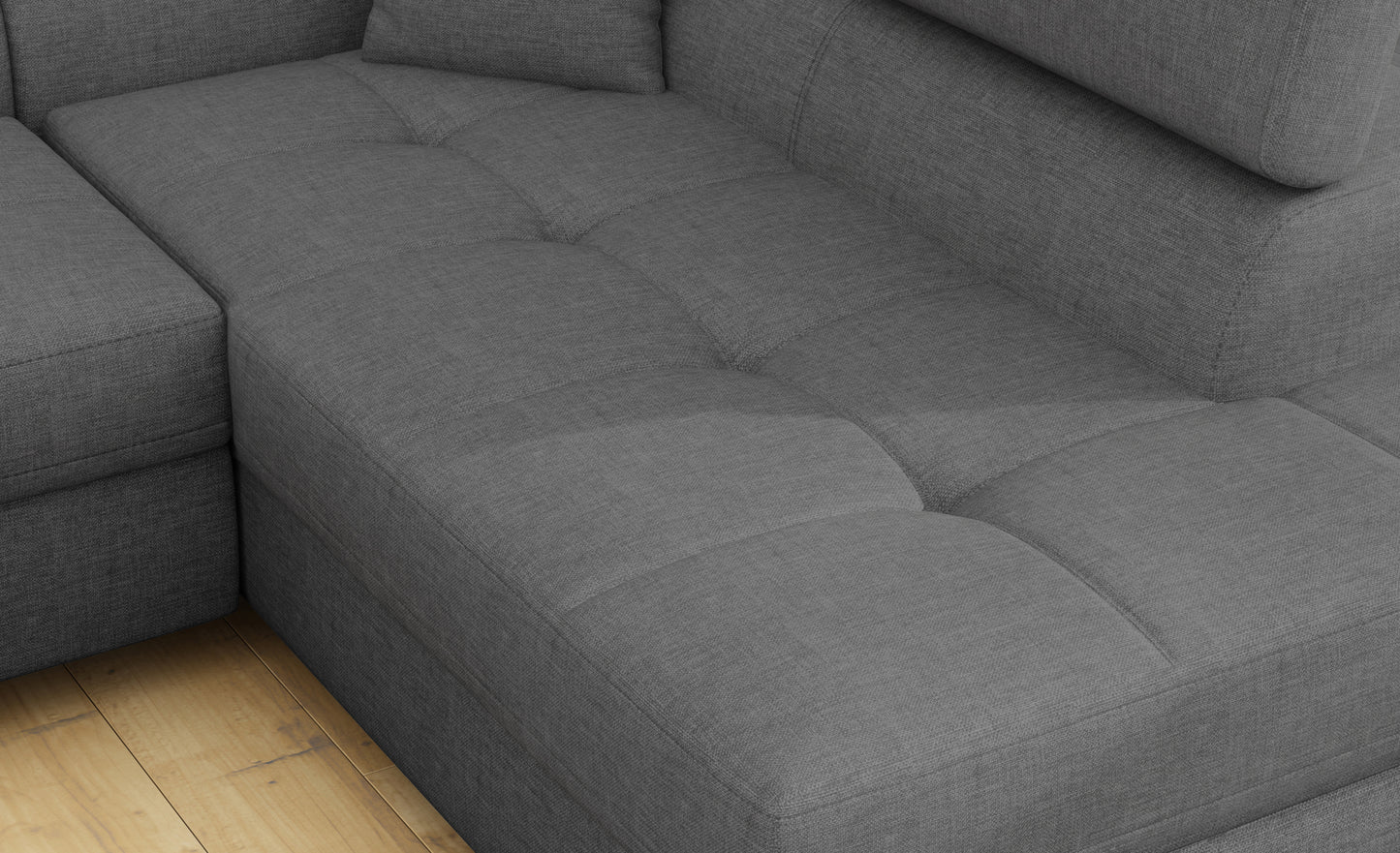 Zbliżenie na siedzisko narożnika Anton w kolorze Sawana 21 szary.