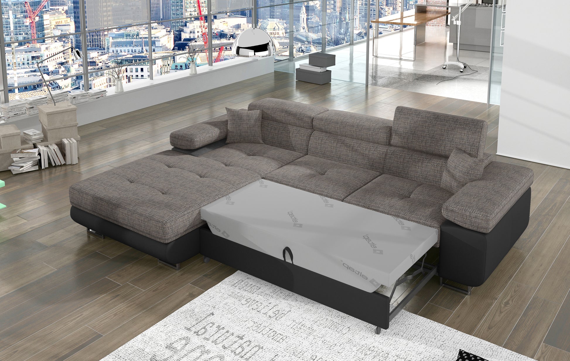 Narożnik Armando Berlin 01 szary / Soft 11 czarny – prezentacja funkcji spania z wysuniętym mechanizmem, ujęcie z góry.