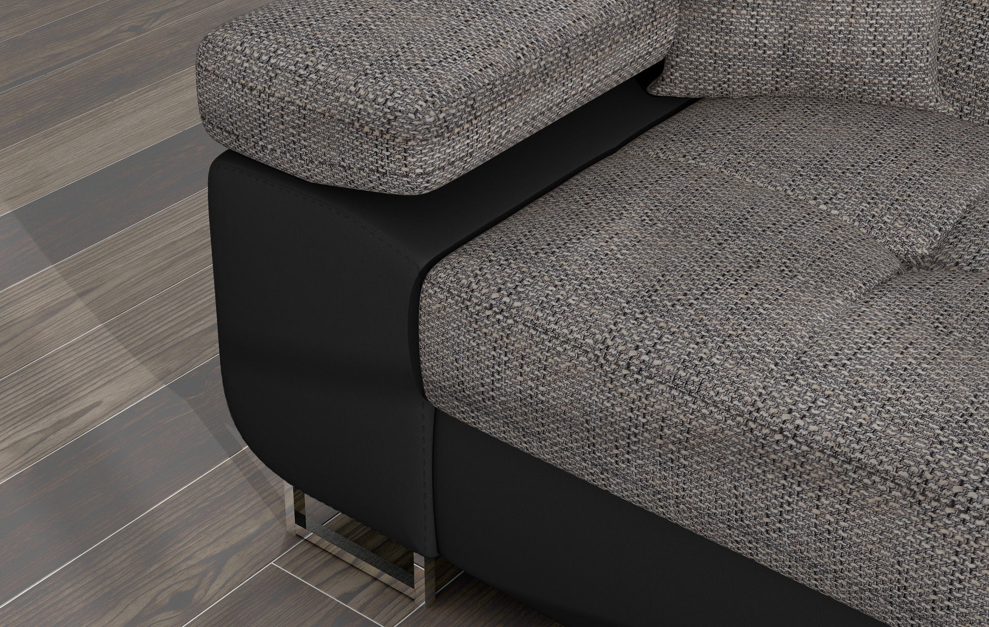 Zbliżenie na podłokietnik narożnika Armando w tkaninie Berlin 01 szary z czarną podstawą Soft 11.