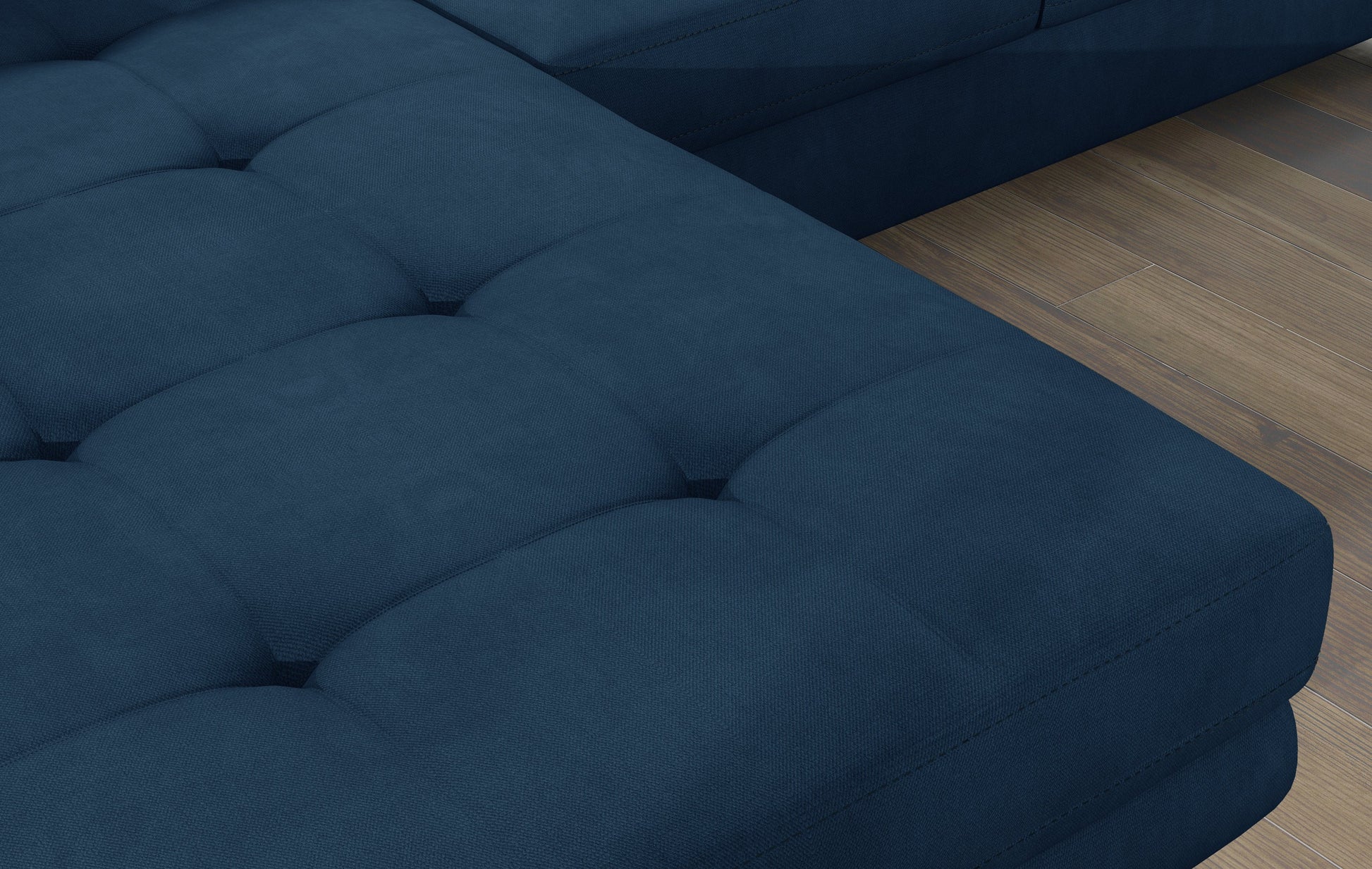 Zbliżenie na pikowane siedzisko narożnika Armando w tkaninie Kronos 09 granatowy – wyraźna aksamitna struktura materiału.