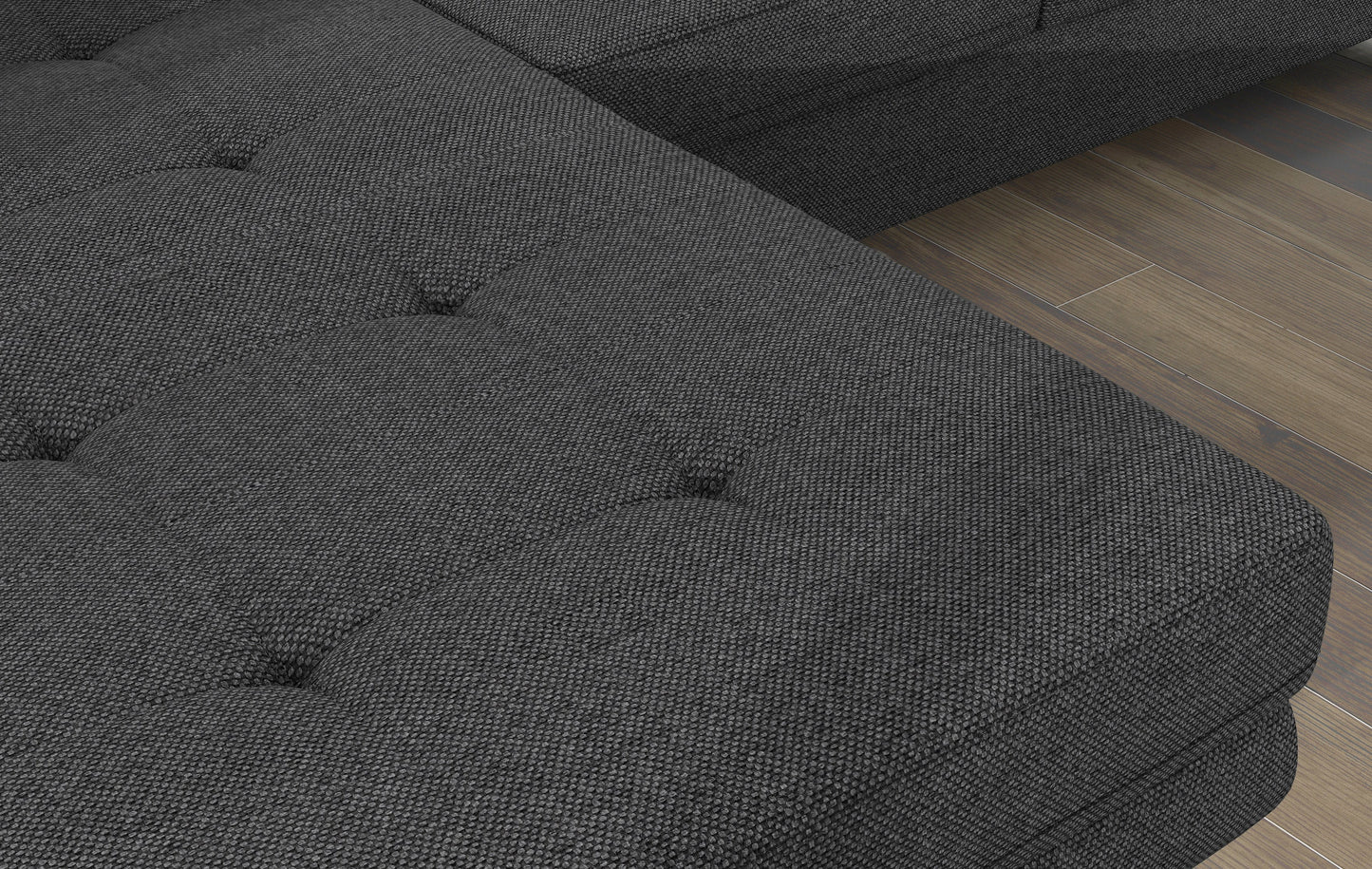 Zbliżenie na pikowane siedzisko narożnika Armando w tkaninie Inari 96 ciemnoszary – wyraźna struktura materiału.