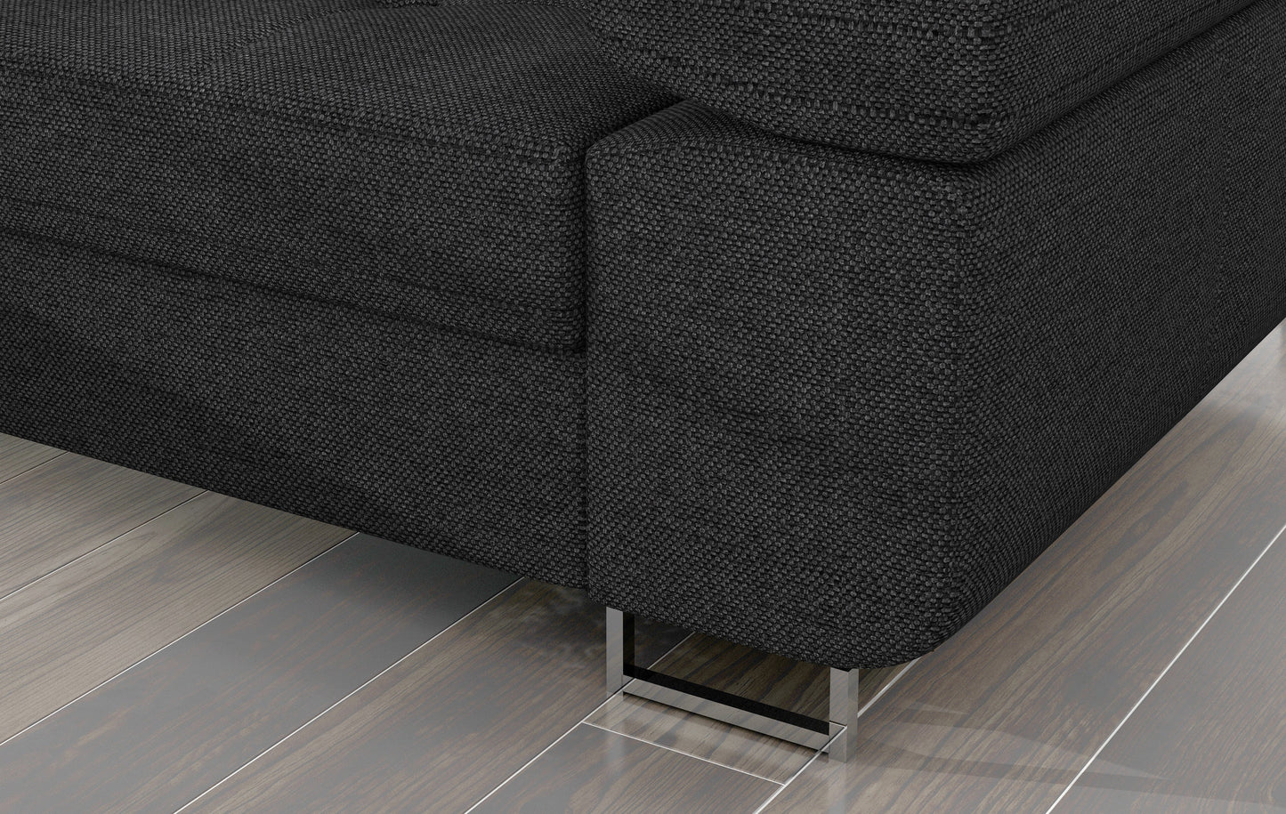 Detal narożnika Armando: ciemnoszara tkanina Inari 96 i metalowa noga – widok narożnika z perspektywy podłogi