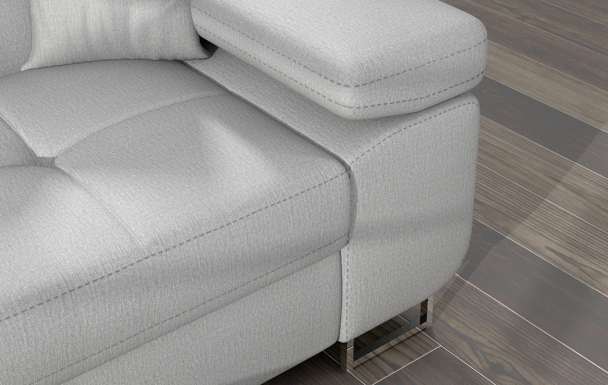 Zbliżenie na podłokietnik narożnika Armando w tkaninie Monolith 84 jasnoszary – prezentacja przeszyć i faktury tapicerki.