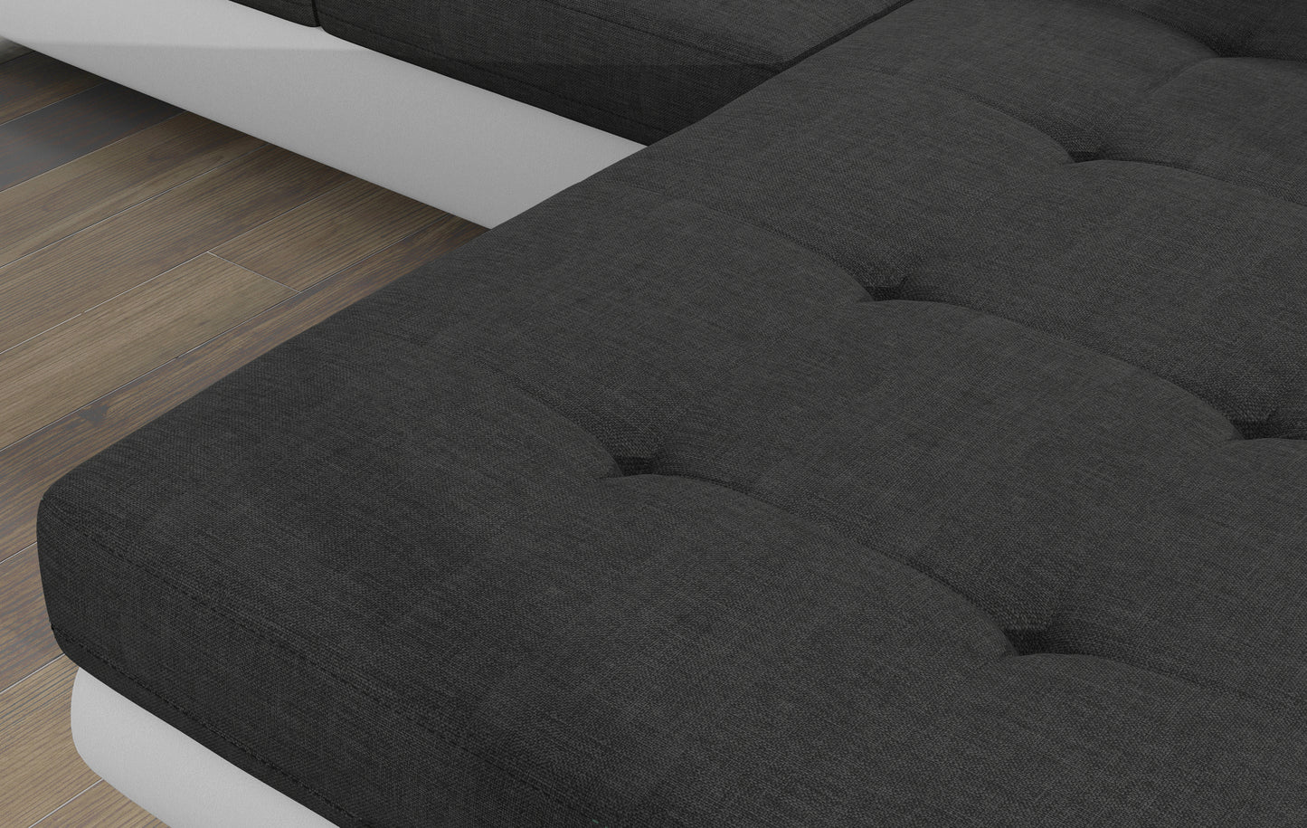 Zbliżenie na siedzisko narożnika Armando w tkaninie Sawana 05 ciemnoszary – widoczna struktura materiału i pikowanie.