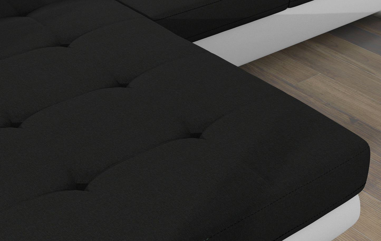 Zbliżenie na pikowane siedzisko narożnika Armando w tkaninie Sawana 14 czarny – wyraźna struktura materiału.