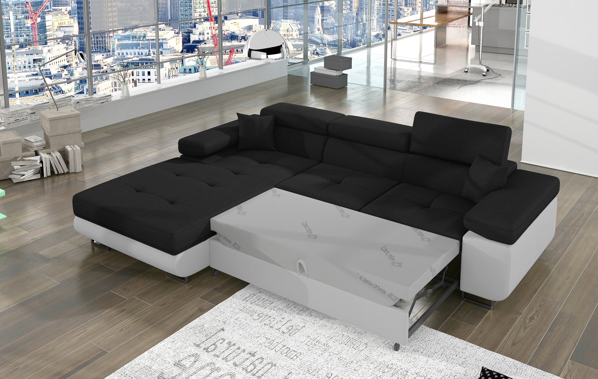 Narożnik Armando Sawana 14 czarny / Soft 17 biały – prezentacja funkcji spania z wysuniętym mechanizmem, ujęcie z góry.