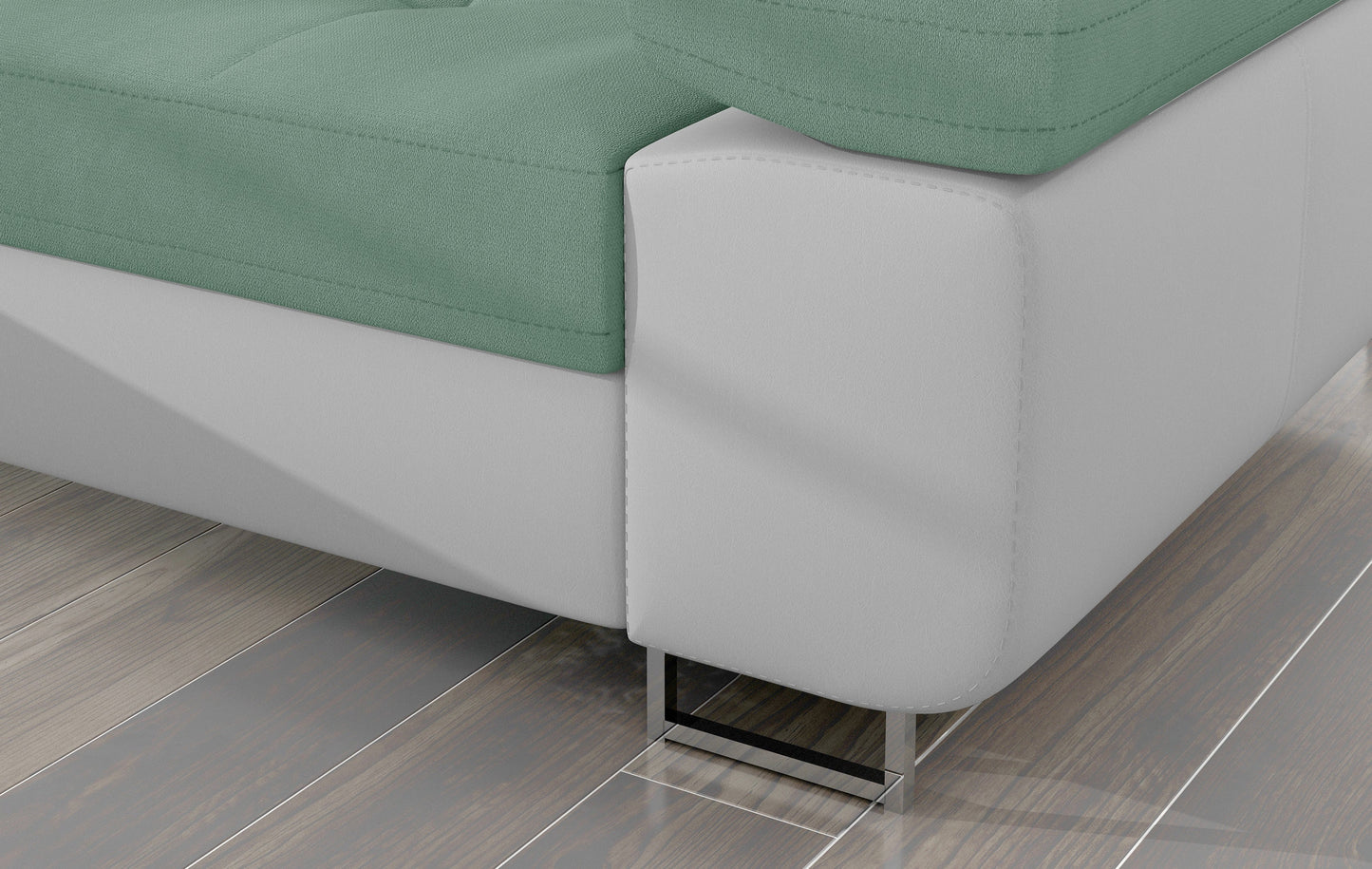 Detal narożnika Armando: jasnozielona tkanina Soro 34 i biała podstawa Soft 17 – widok narożnika z metalową nogą.