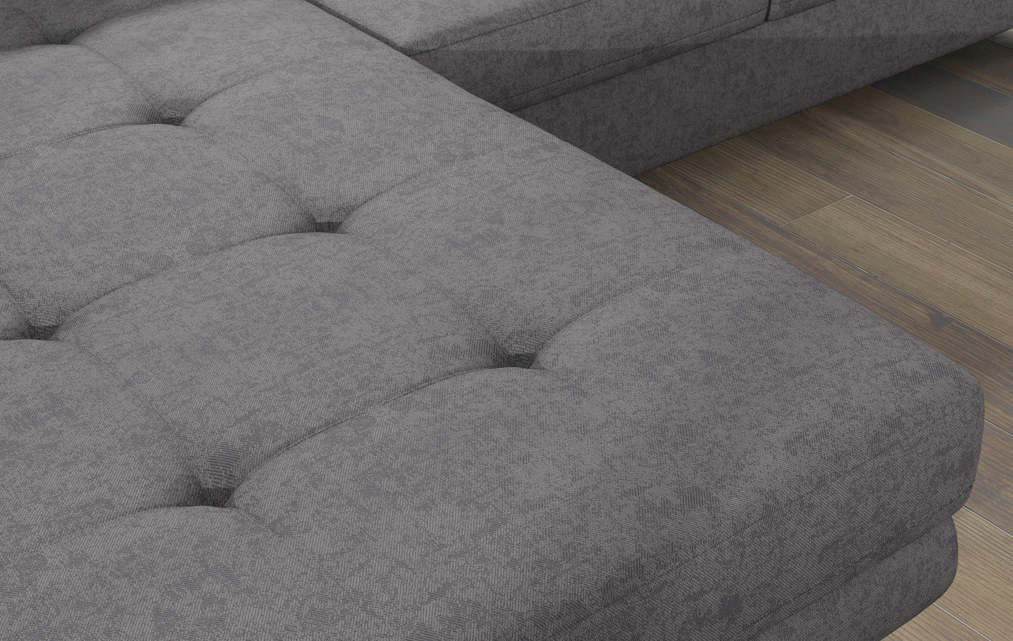 Zbliżenie na pikowane siedzisko narożnika Armando w tkaninie Gusto 88 szary – widoczna faktura materiału i poduszka Zigzag 60.