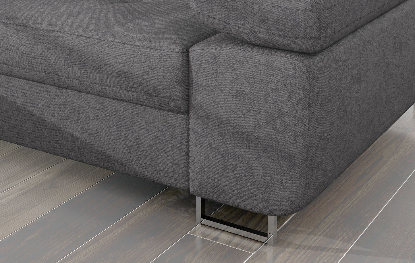 Detal narożnika Armando: szara tkanina Gusto 88 i metalowa noga – widok narożnika z perspektywy podłogi.