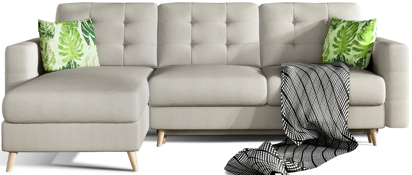 Narożnik Asgard L w kolorze Cover 02 z poduszkami Jungle 32 w stylu urban jungle, widok na białym tle z dekoracyjnym pledem w czerni i bieli.