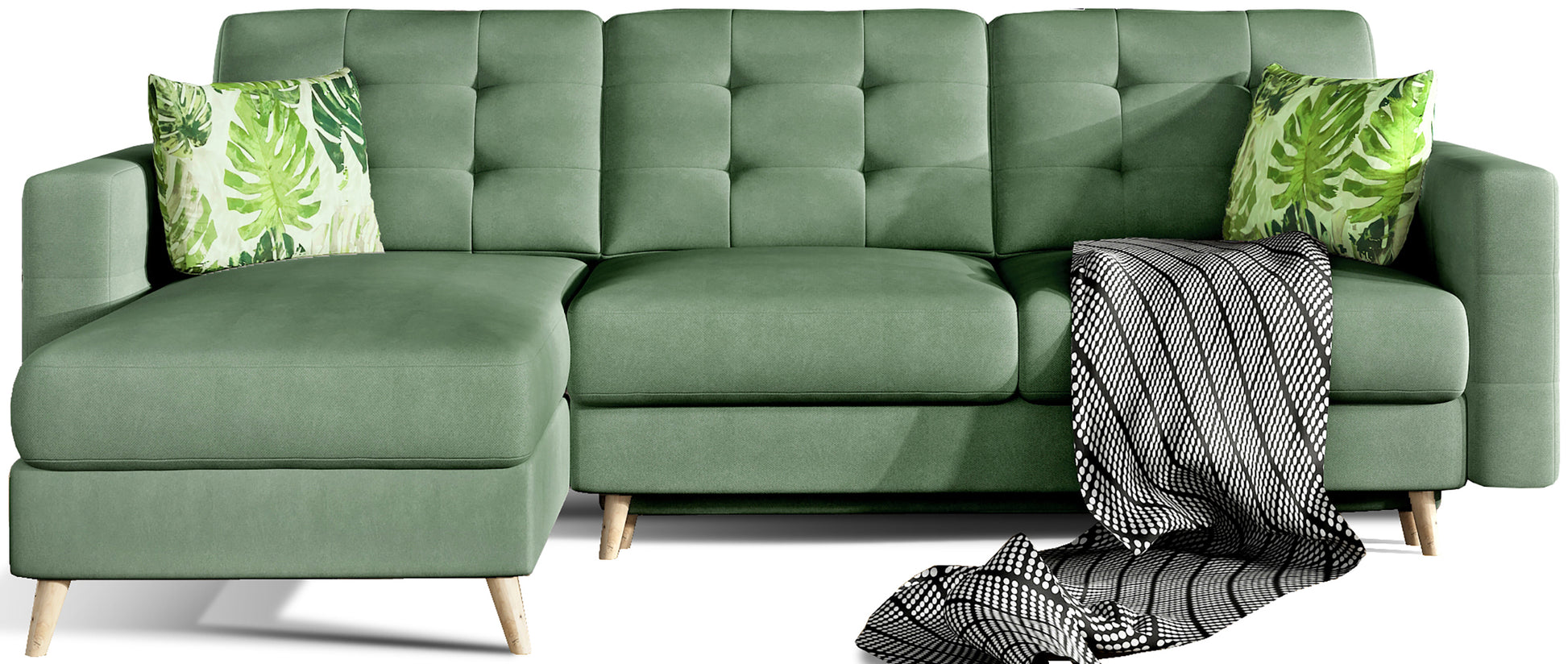 Narożnik Asgard L w kolorze jasnozielonym Soro 34 z poduszkami Jungle 32, widok z przodu na białym tle, z dekoracyjnym kocem i drewnianymi nogami.