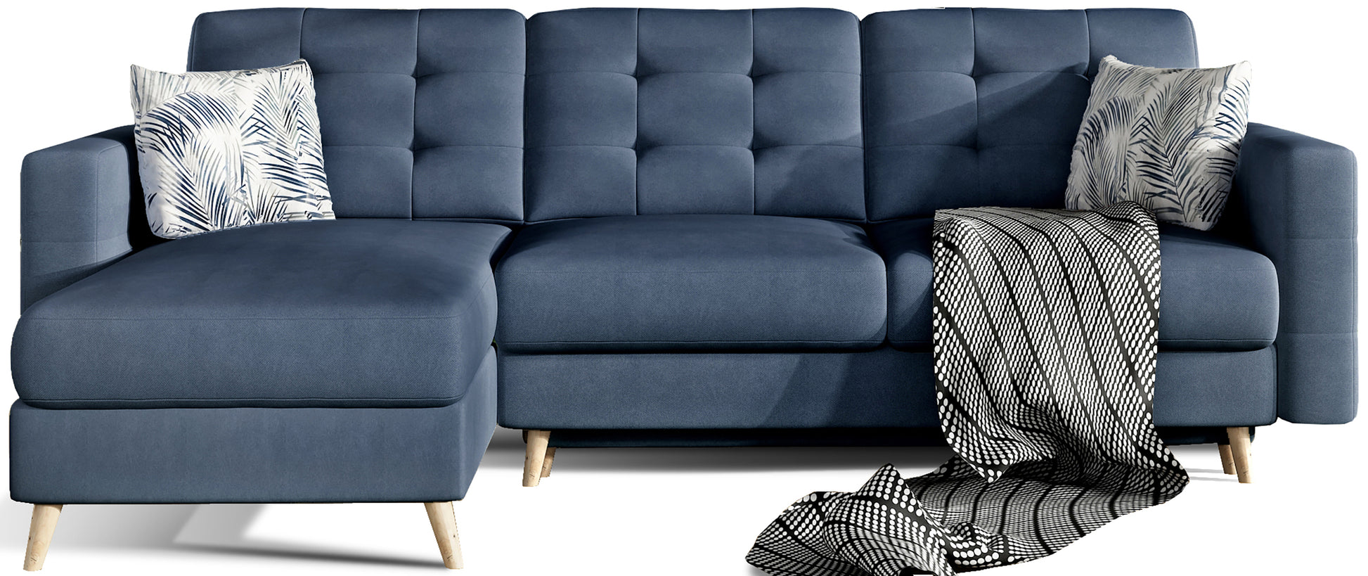 Granatowy narożnik Asgard L w tkaninie Soro 75 z dekoracyjnymi poduszkami Botanical 80 i eleganckim pledem na białym tle.