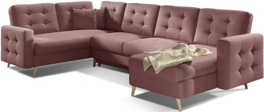 Duży narożnik Asgard w tkaninie MattVelvet 63 w kolorze różowym z funkcjonalnym układem U i eleganckim wykończeniem. Mebel łączy nowoczesny design z wygodą, tworząc przytulną przestrzeń dla całej rodziny.