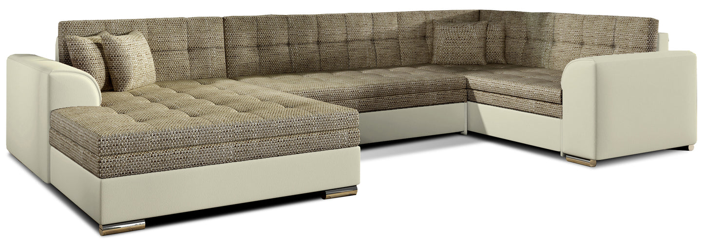 Narożnik Damario w układzie lewym, tapicerowany tkaniną Berlin 03 ciemnobeżowy i ekoskórą Soft 33 beżowy, widok na całą bryłę z poduszkami.