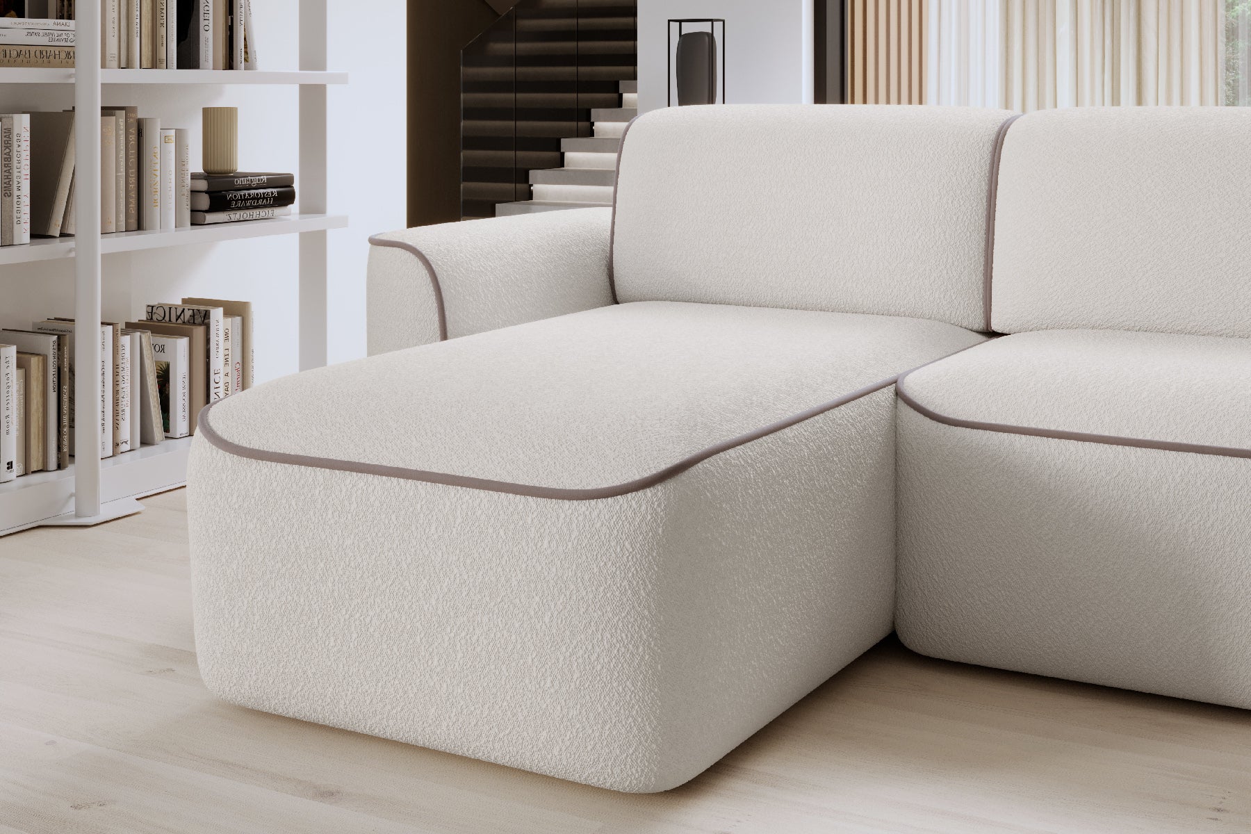 Zbliżenie szezlonga narożnika Ume Royal 01 biały/Paros 02 beżowy, układ prawy na tle jasnej, drewnianej podłogi.